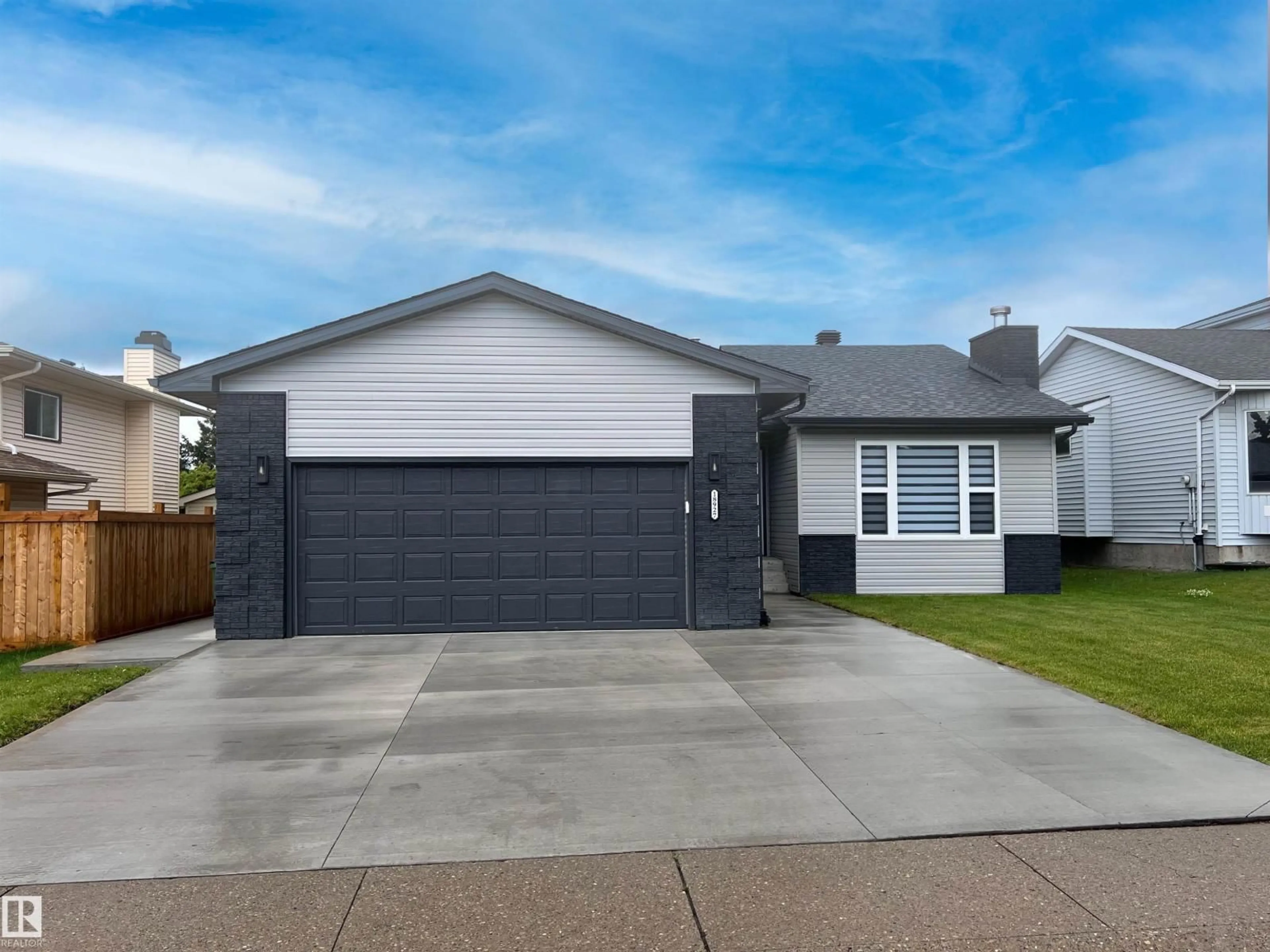 Home with vinyl exterior material, street for 18927 95A AV, Edmonton Alberta T5T5K9