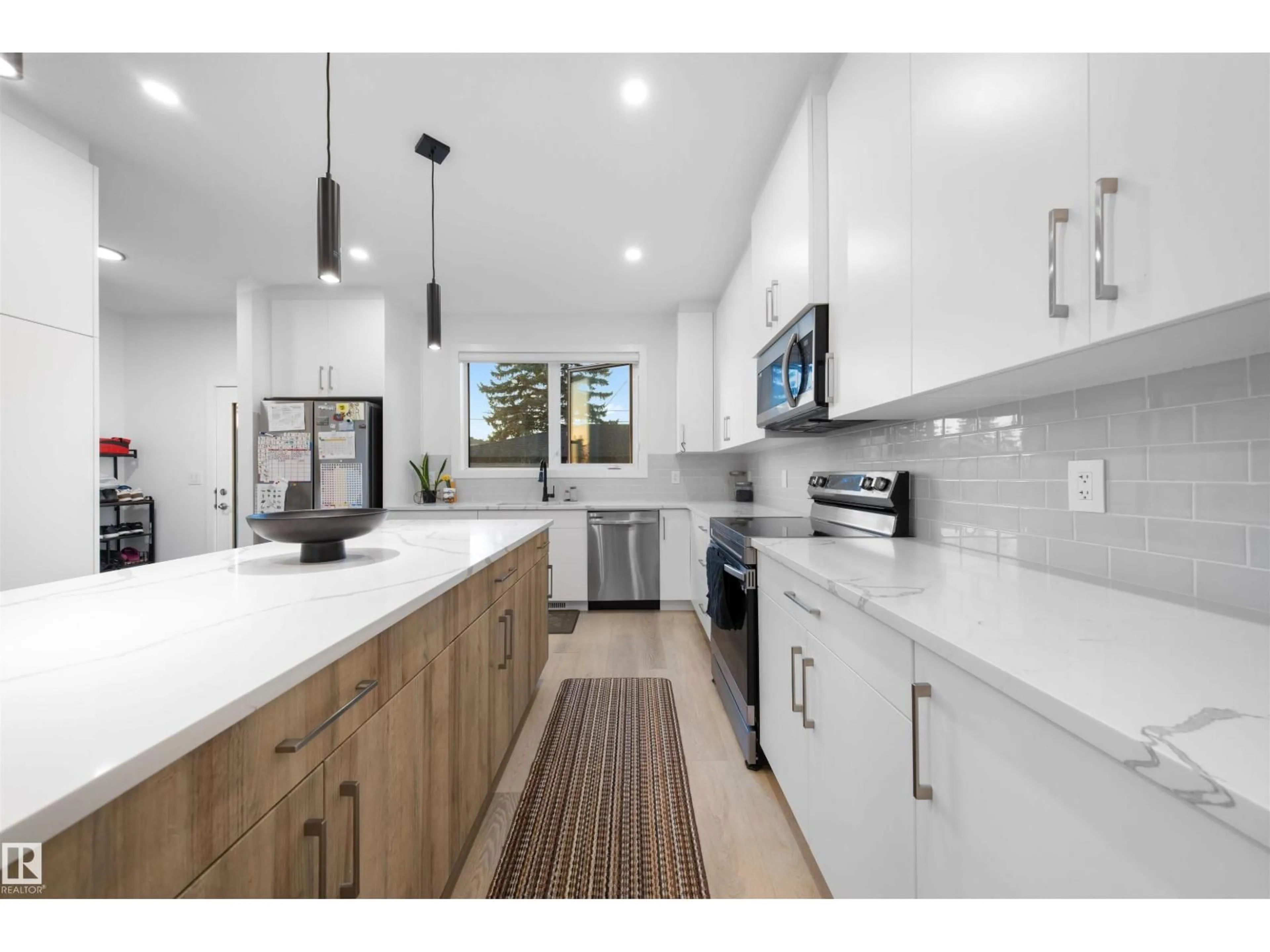 Open concept kitchen, unknown for NW - 11204 & 11206 55 AV, Edmonton Alberta T6H0X1