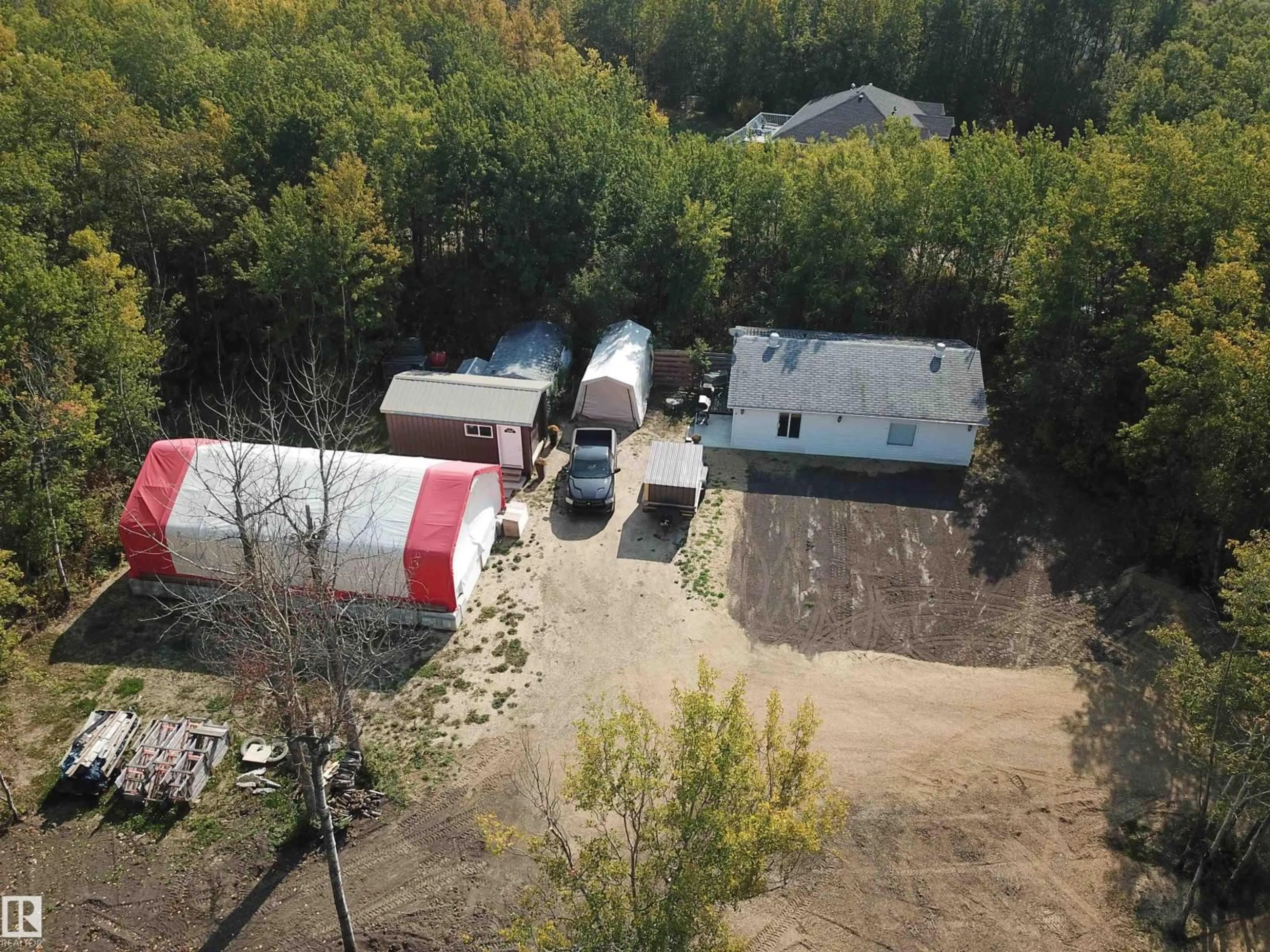 A pic from outside/outdoor area/front of a property/back of a property/a pic from drone, unknown for 36 20120 TWP RD 515, Rural Beaver County Alberta T0B4J1