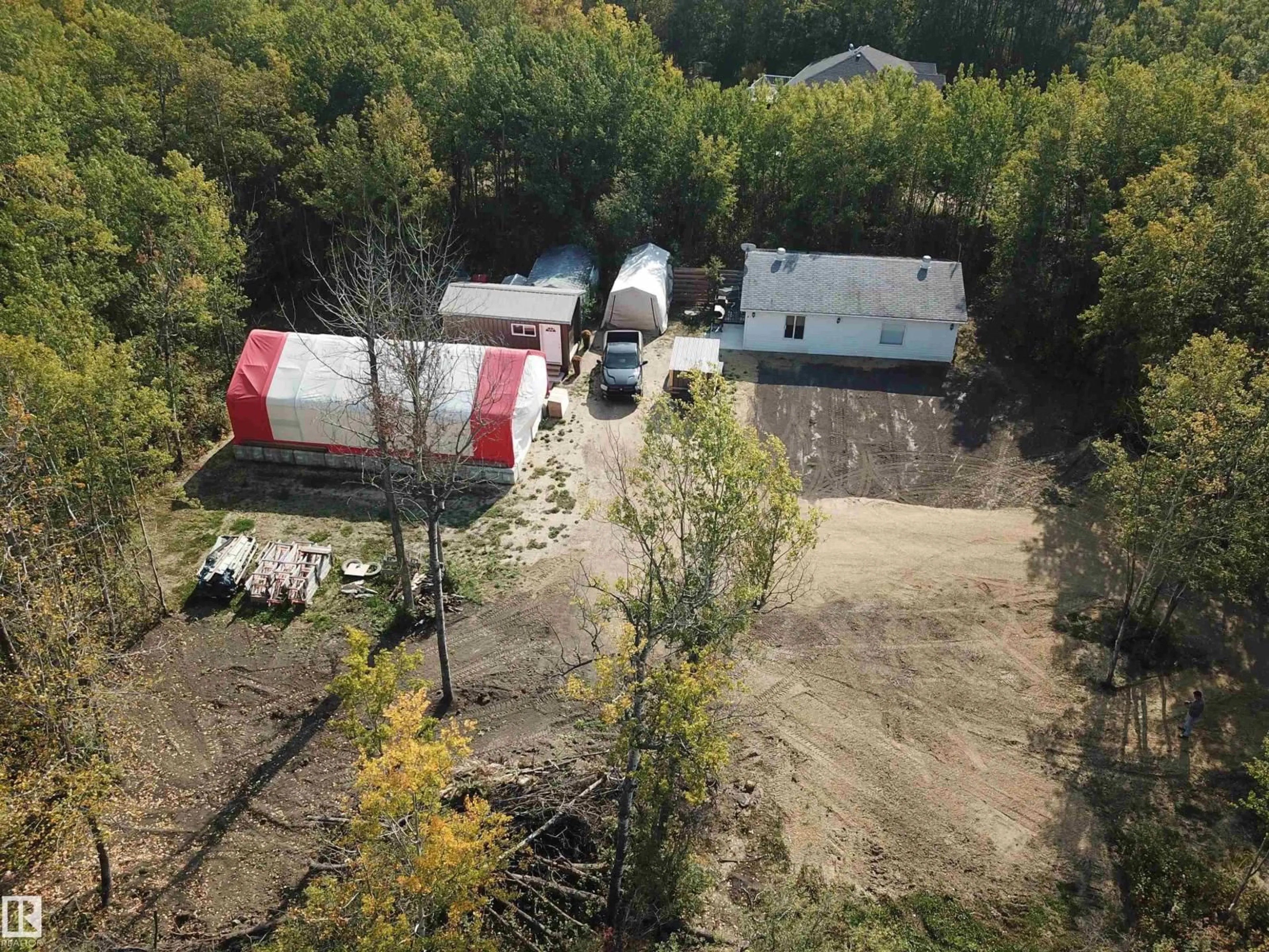 A pic from outside/outdoor area/front of a property/back of a property/a pic from drone, unknown for 36 20120 TWP RD 515, Rural Beaver County Alberta T0B4J1