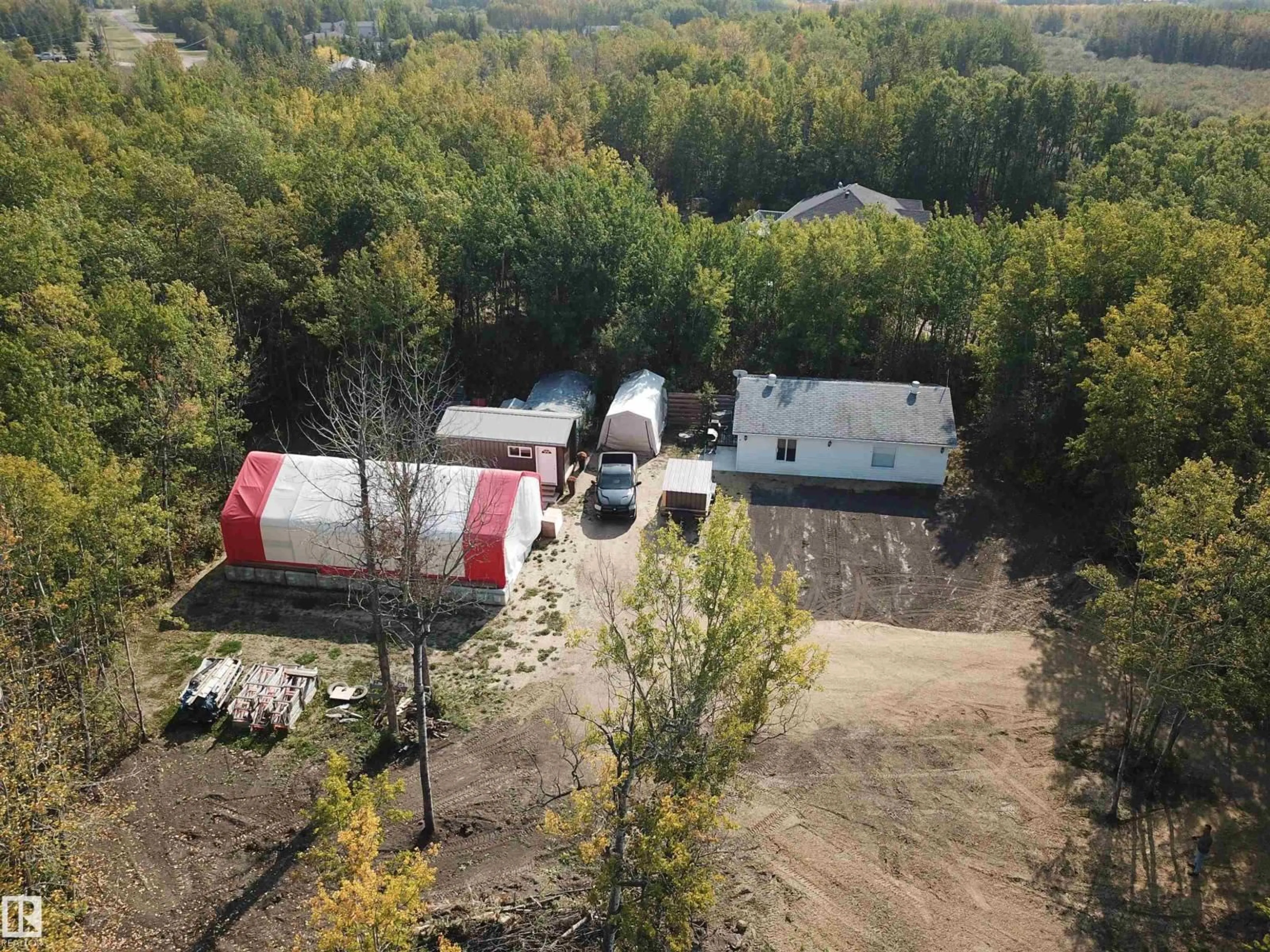 A pic from outside/outdoor area/front of a property/back of a property/a pic from drone, forest/trees view for 36 20120 TWP RD 515, Rural Beaver County Alberta T0B4J1