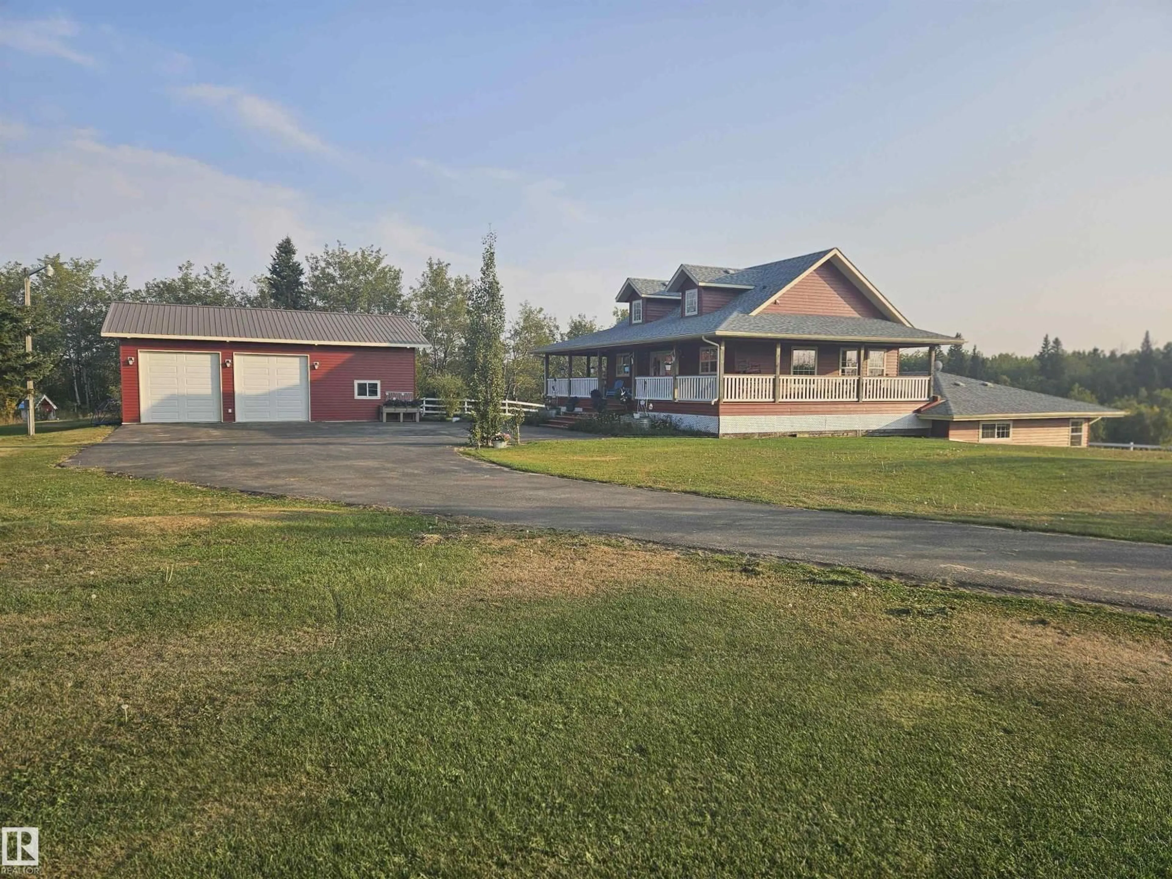 A pic from outside/outdoor area/front of a property/back of a property/a pic from drone, building for 60 240065 TWP ROAD 472, Rural Wetaskiwin County Alberta T9A1X1
