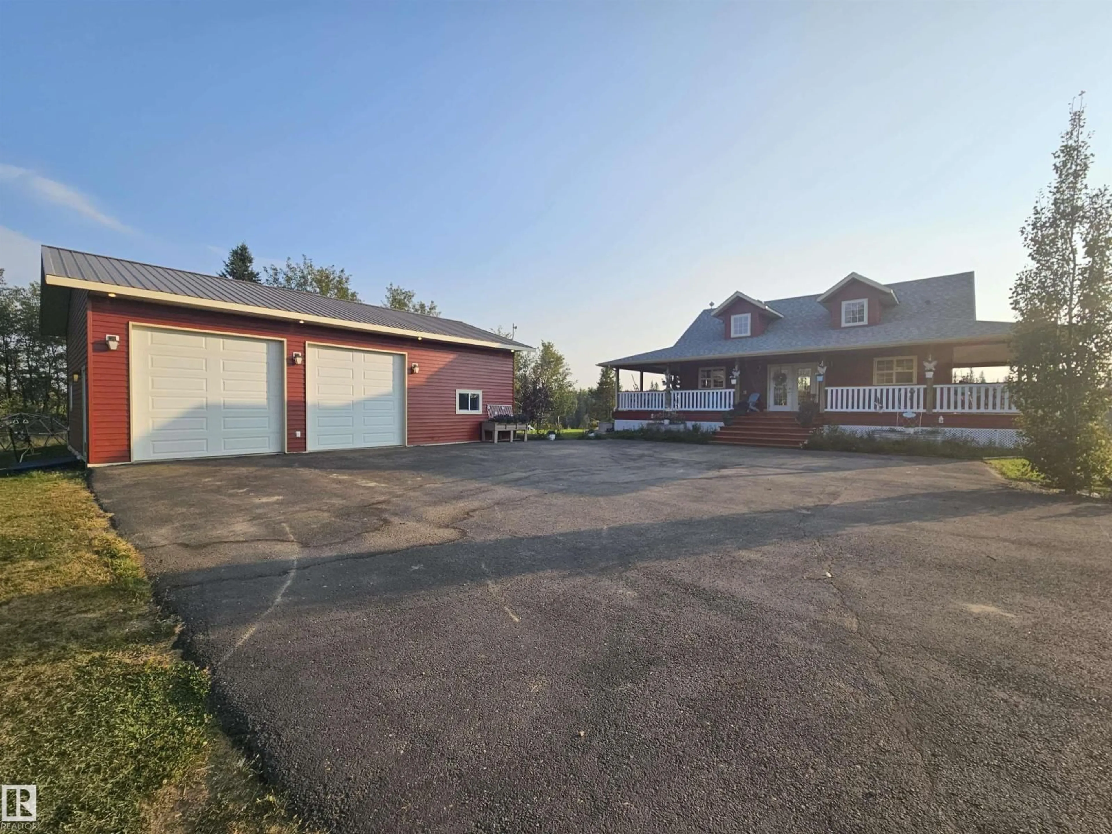 A pic from outside/outdoor area/front of a property/back of a property/a pic from drone, building for 60 240065 TWP ROAD 472, Rural Wetaskiwin County Alberta T9A1X1