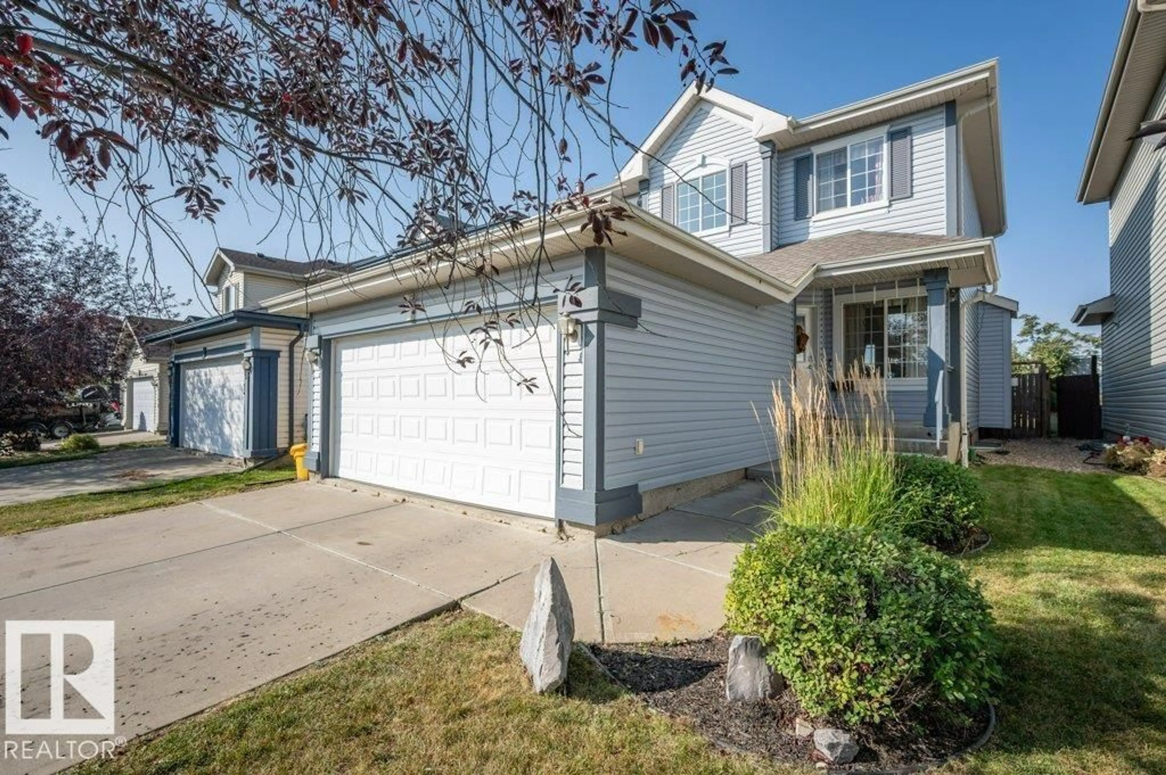 Home with vinyl exterior material, street for 15128 141 ST, Edmonton Alberta T6V1V1
