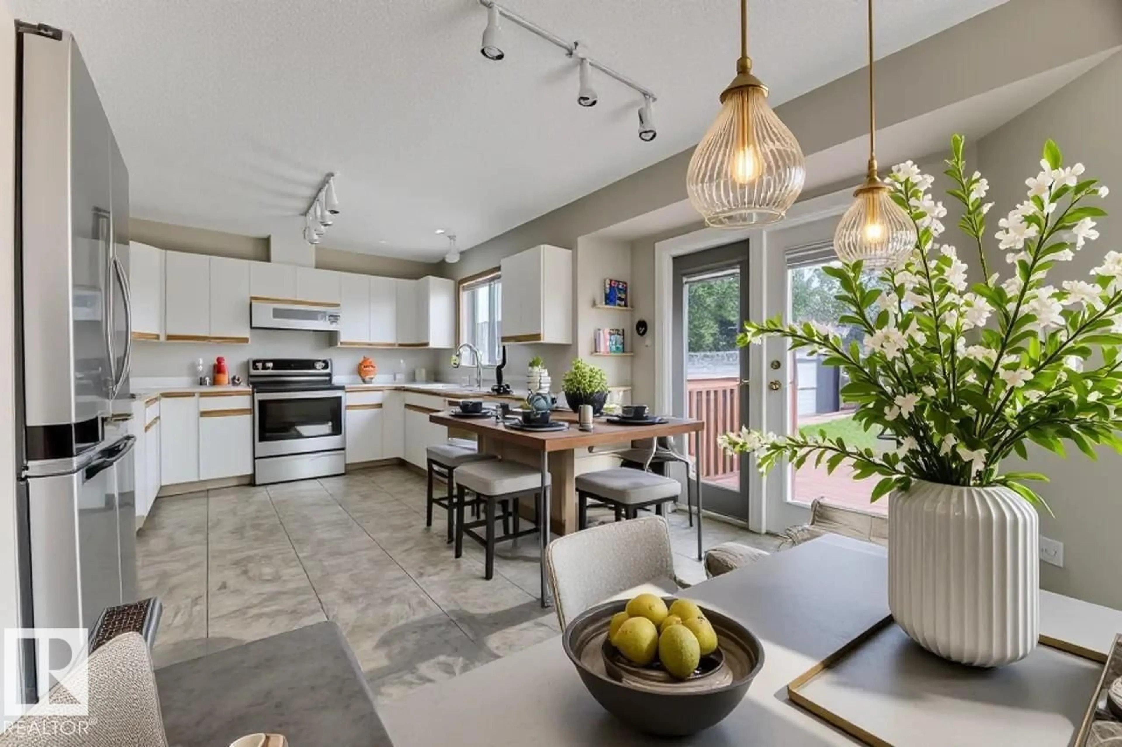 Open concept kitchen, ceramic/tile floor for NW - 9944 178 AV, Edmonton Alberta T5X5X2