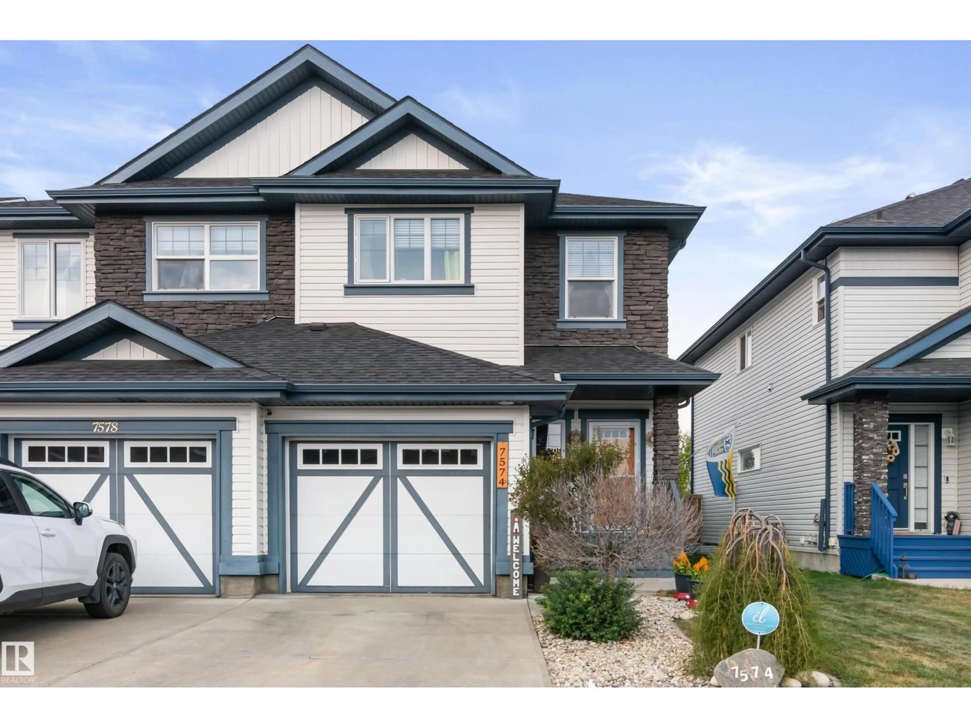 Home with vinyl exterior material, street for 7574 ELLESMERE WY, Sherwood Park Alberta T8H0P7