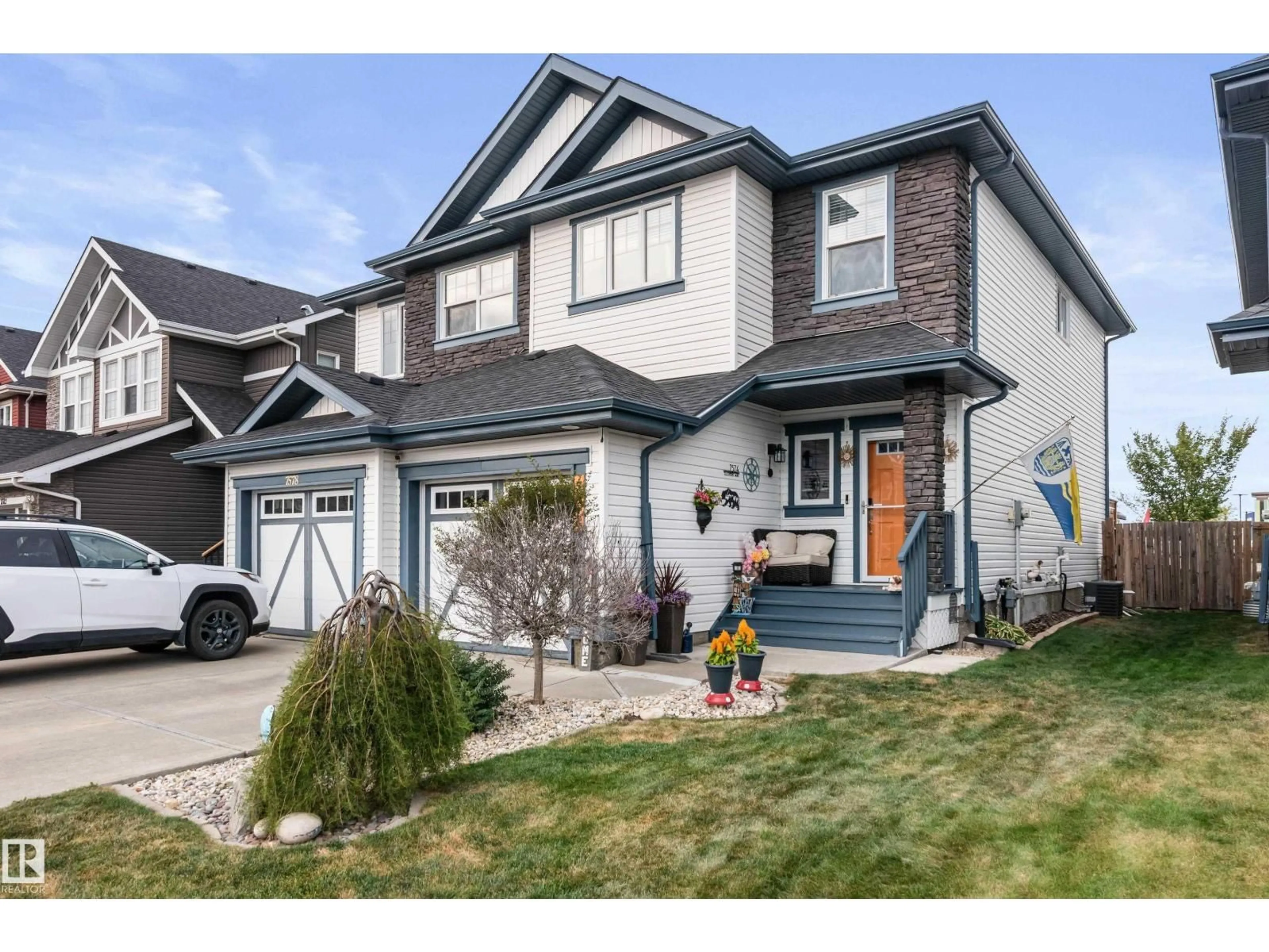Home with vinyl exterior material, street for 7574 ELLESMERE WY, Sherwood Park Alberta T8H0P7