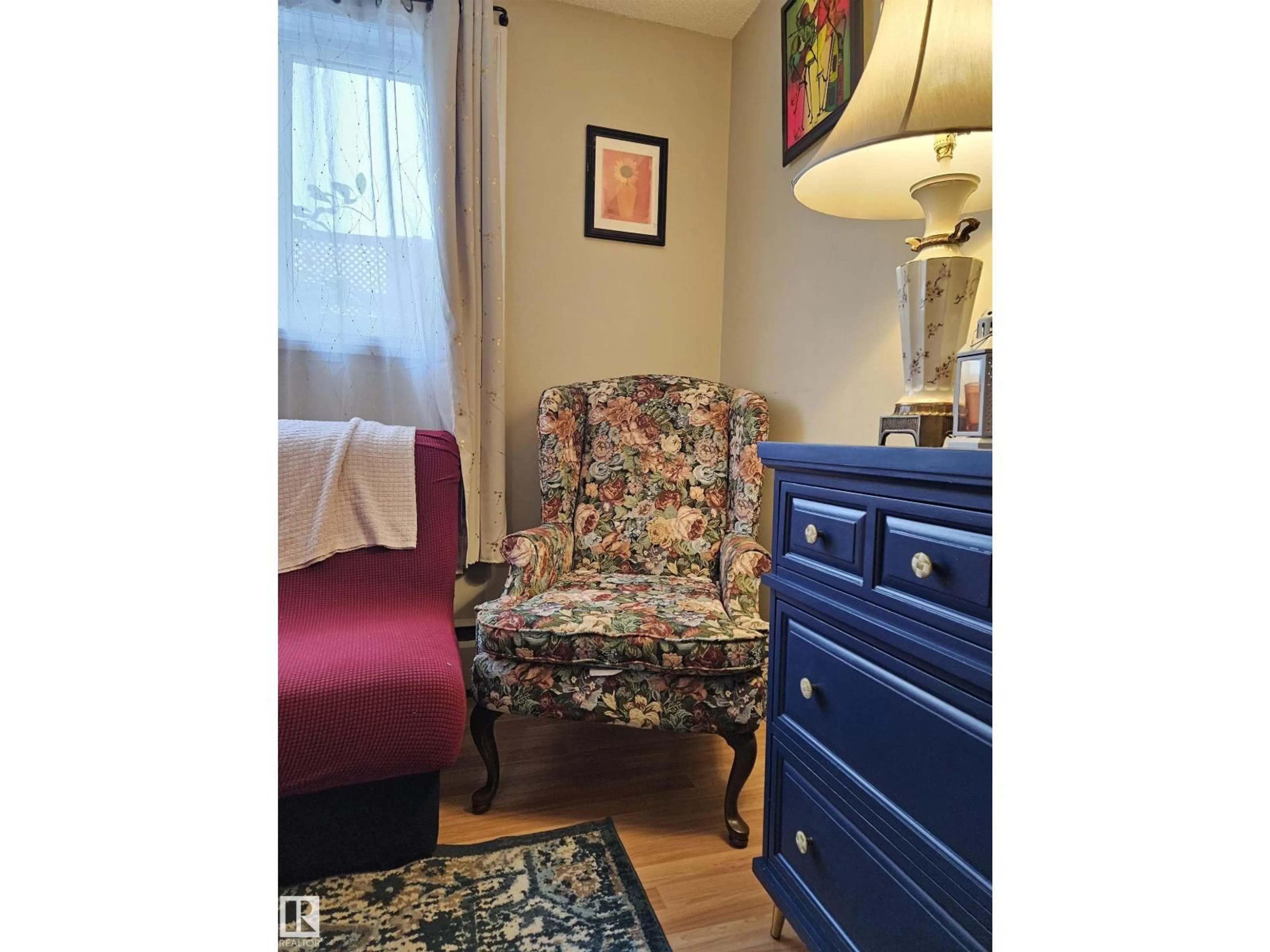 Living room with furniture, wood/laminate floor for #102 - 12223 82 ST, Edmonton Alberta T5B2W9
