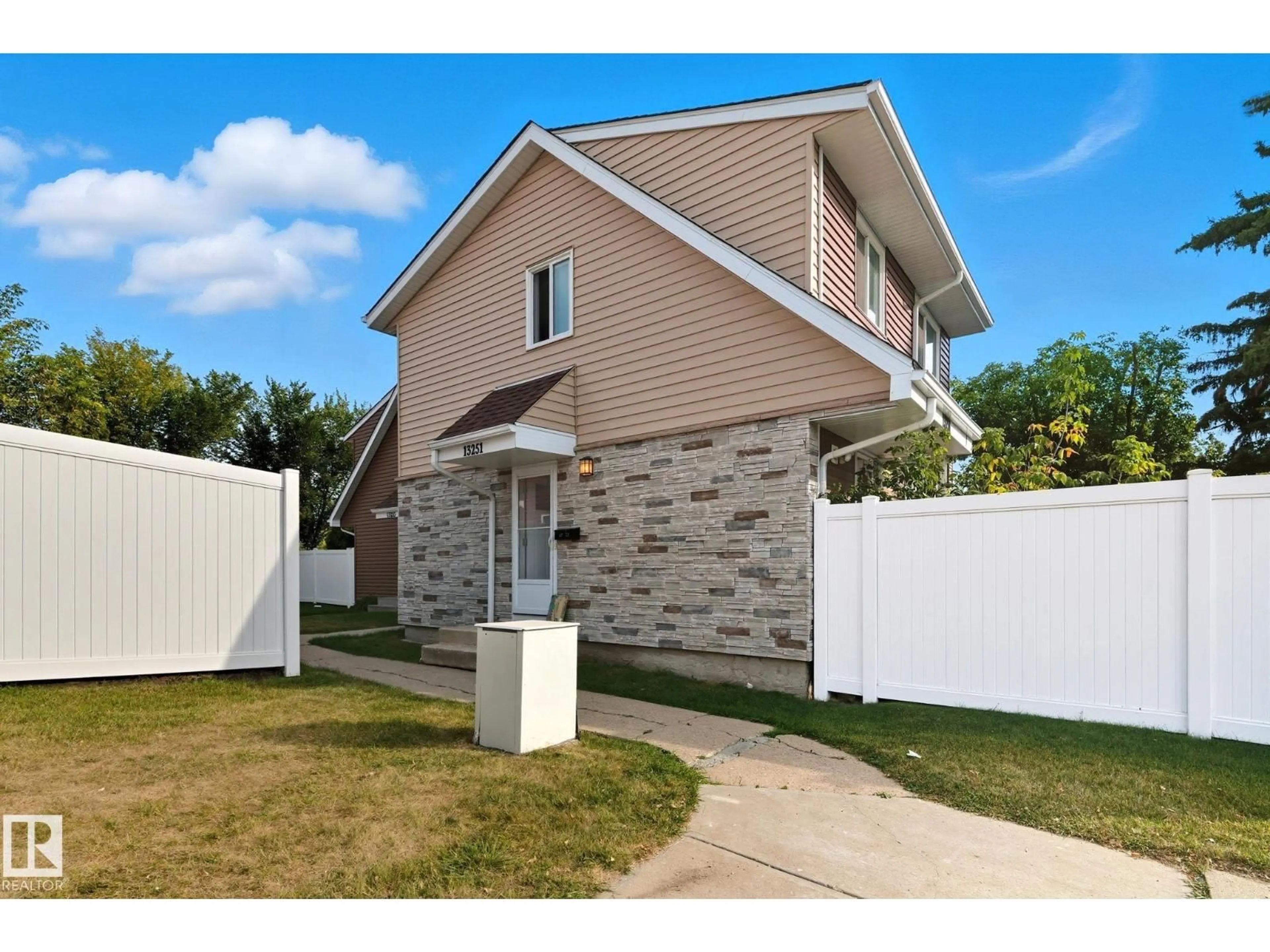 Home with vinyl exterior material, street for 13251 47 ST, Edmonton Alberta T5A3L5
