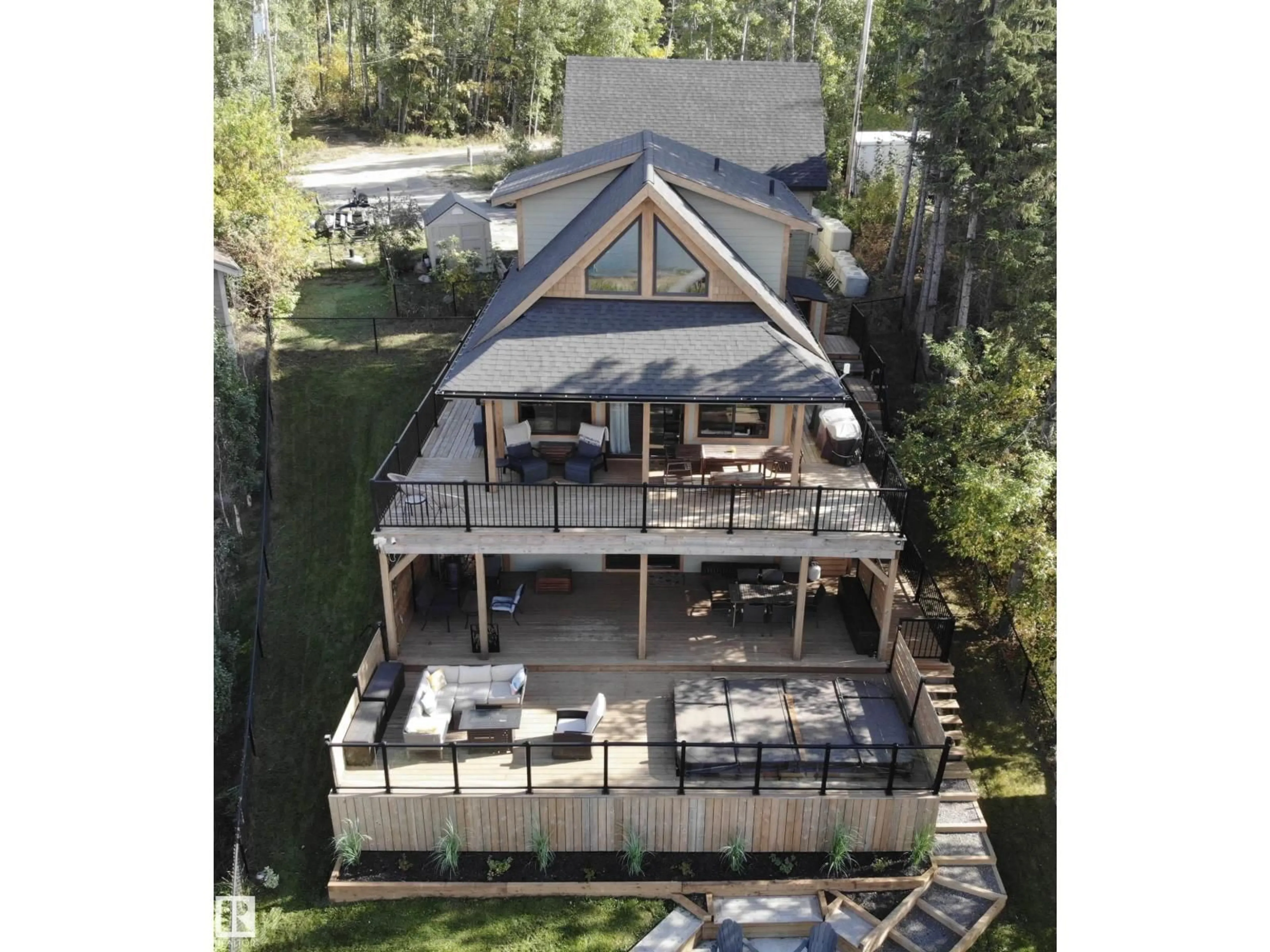 A pic from outside/outdoor area/front of a property/back of a property/a pic from drone, mountain view for #23 - 2332 TWP 521, Rural Parkland County Alberta T7Y2L7