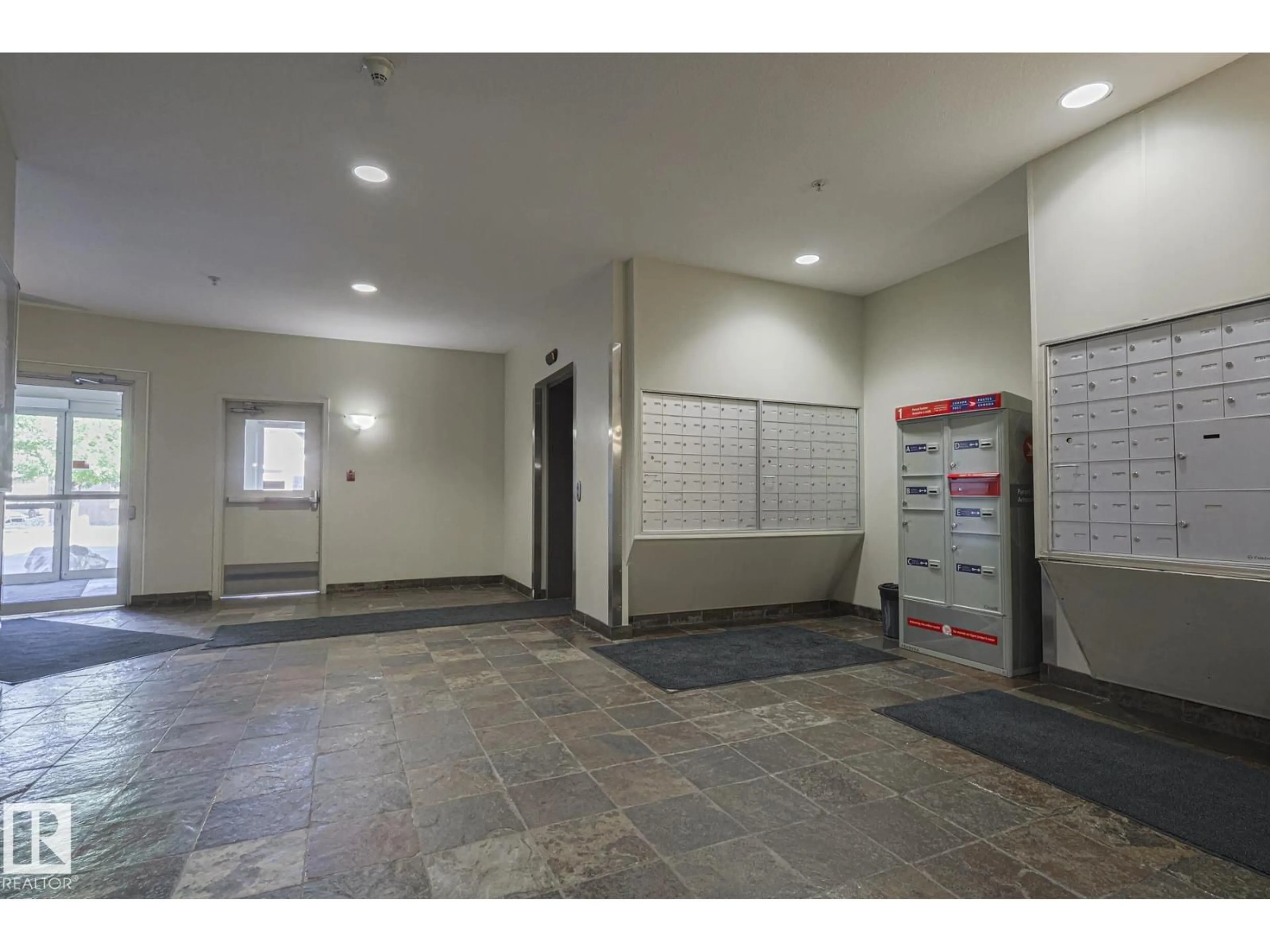 Indoor foyer for #101 - 4304 139 AV, Edmonton Alberta T5Y0H6