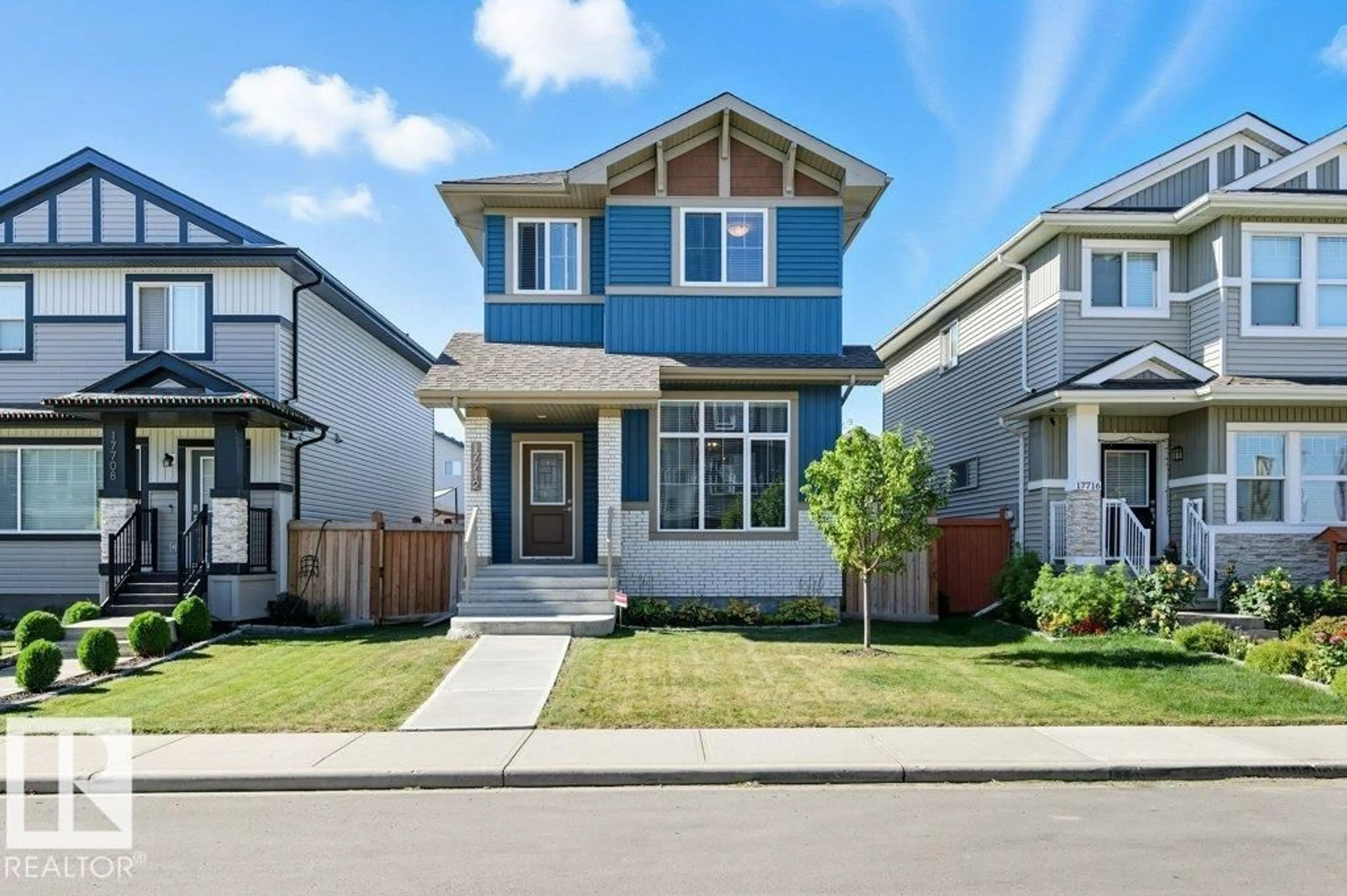 Home with vinyl exterior material, street for NW - 17712 58 ST, Edmonton Alberta T5Y3W8