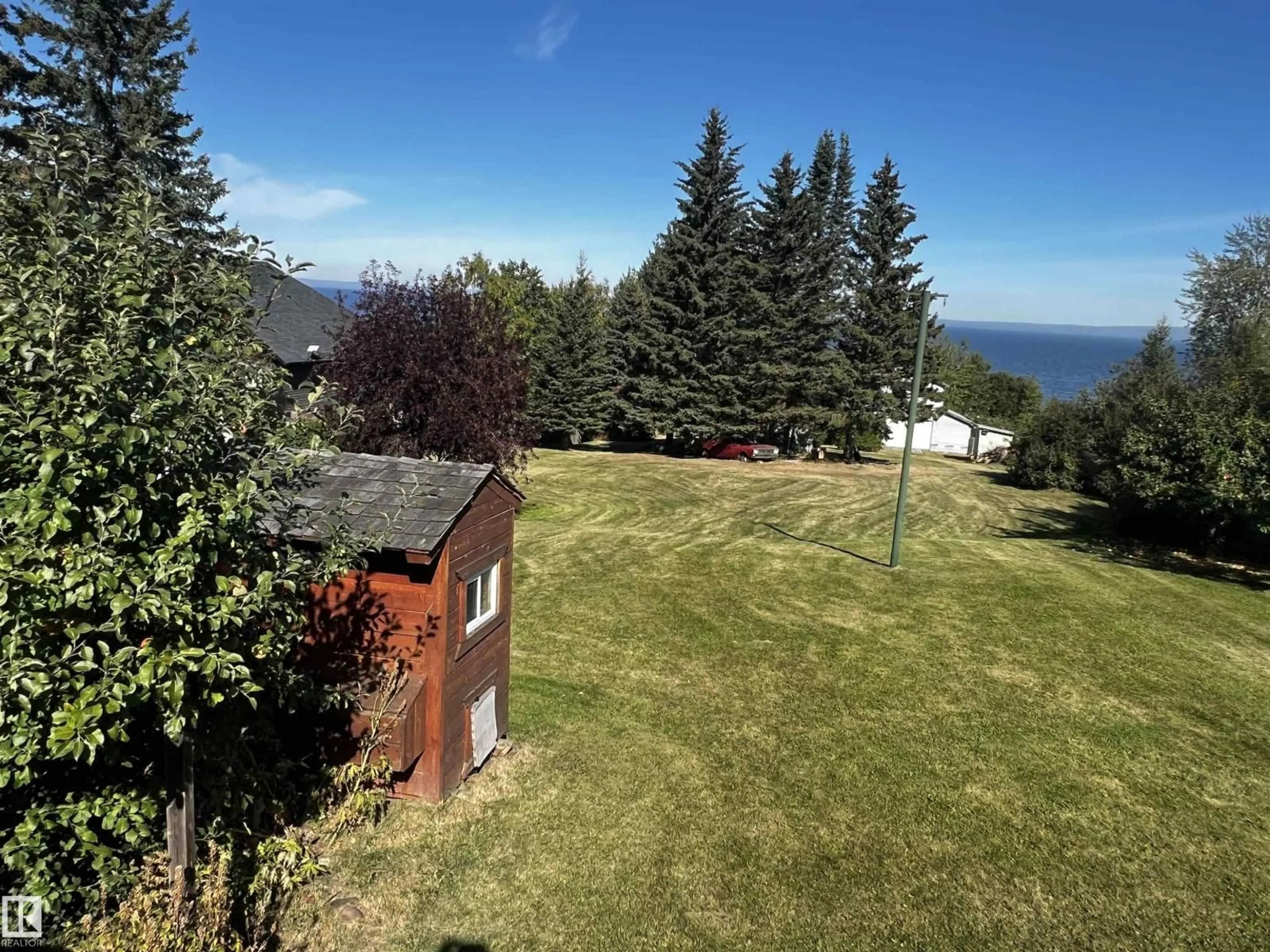 A pic from outside/outdoor area/front of a property/back of a property/a pic from drone, water/lake/river/ocean view for 74038 BIRCH AV, Widewater Alberta T0G2M0