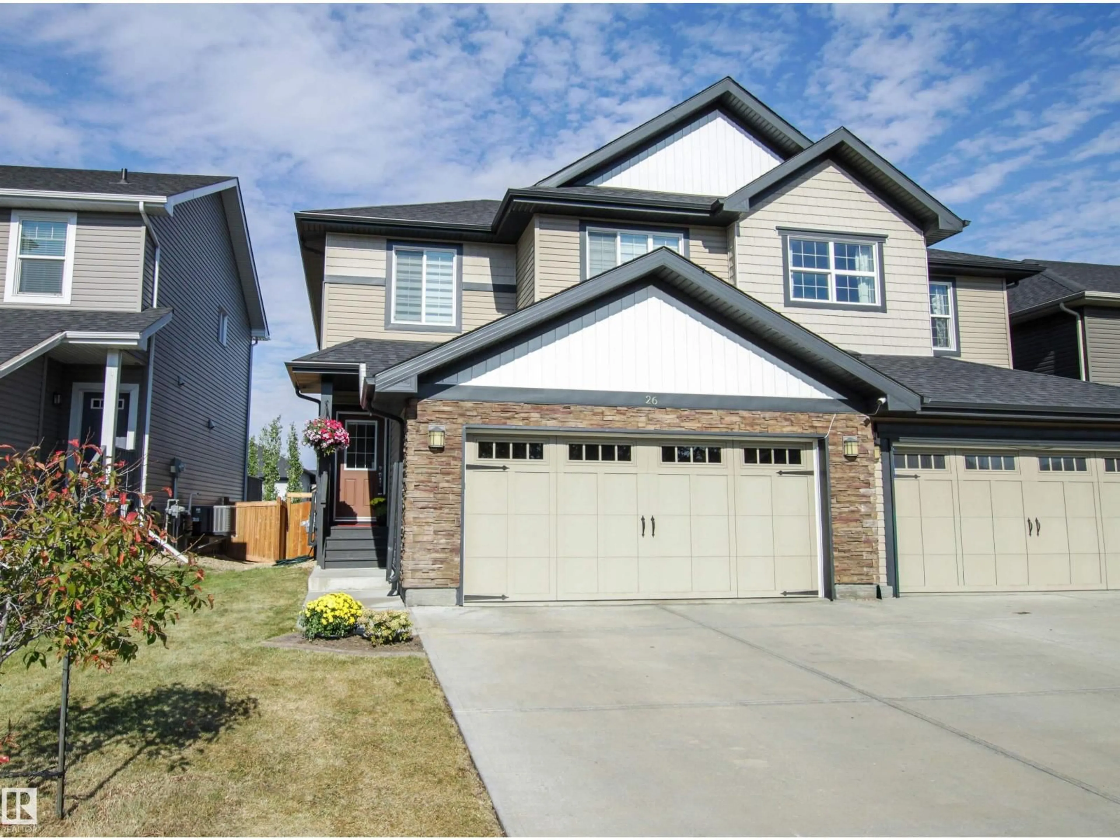 Home with vinyl exterior material, street for 26 AMBLESIDE WY, Sherwood Park Alberta T8H1A5