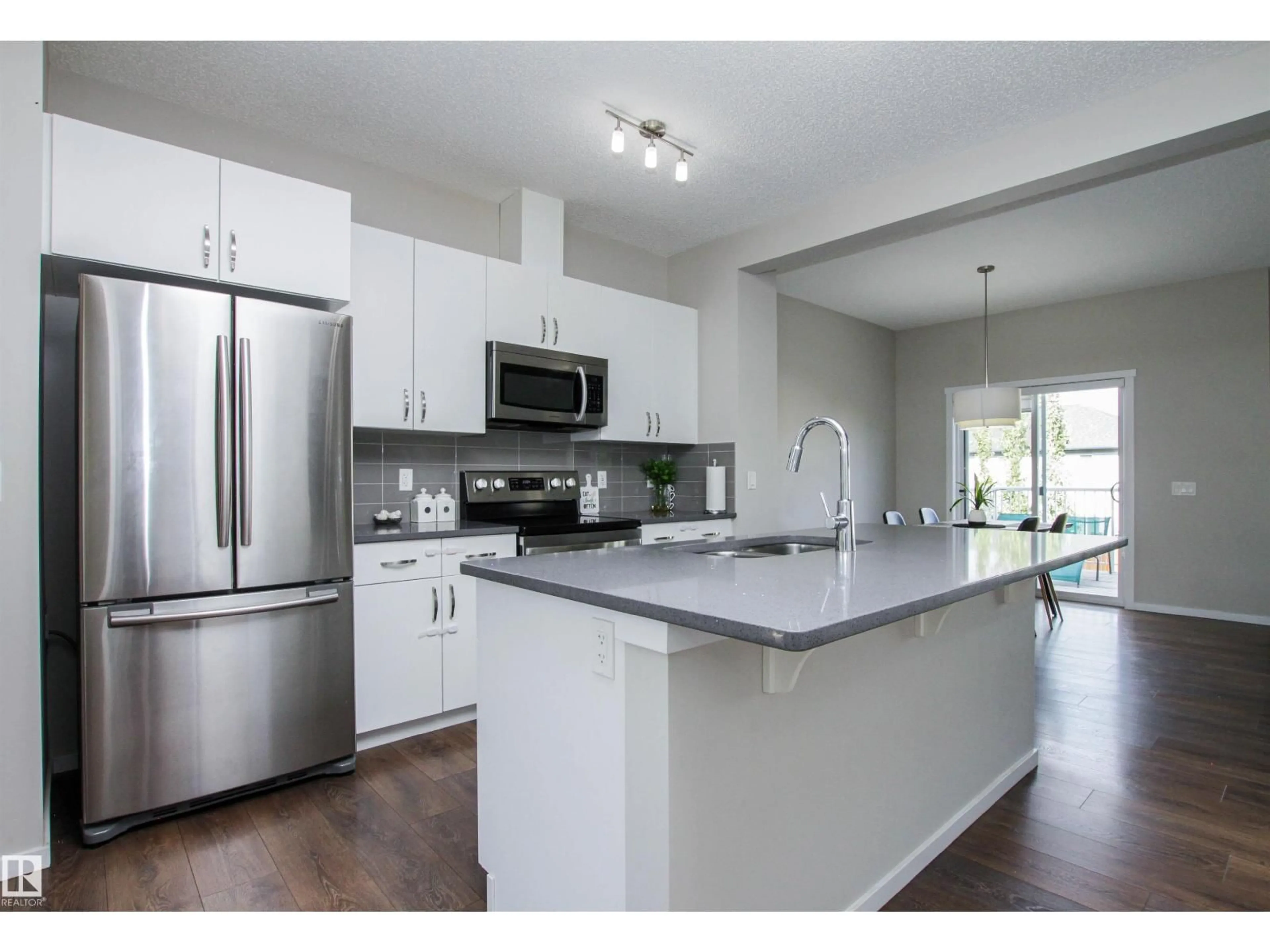 Open concept kitchen, unknown for 26 AMBLESIDE WY, Sherwood Park Alberta T8H1A5
