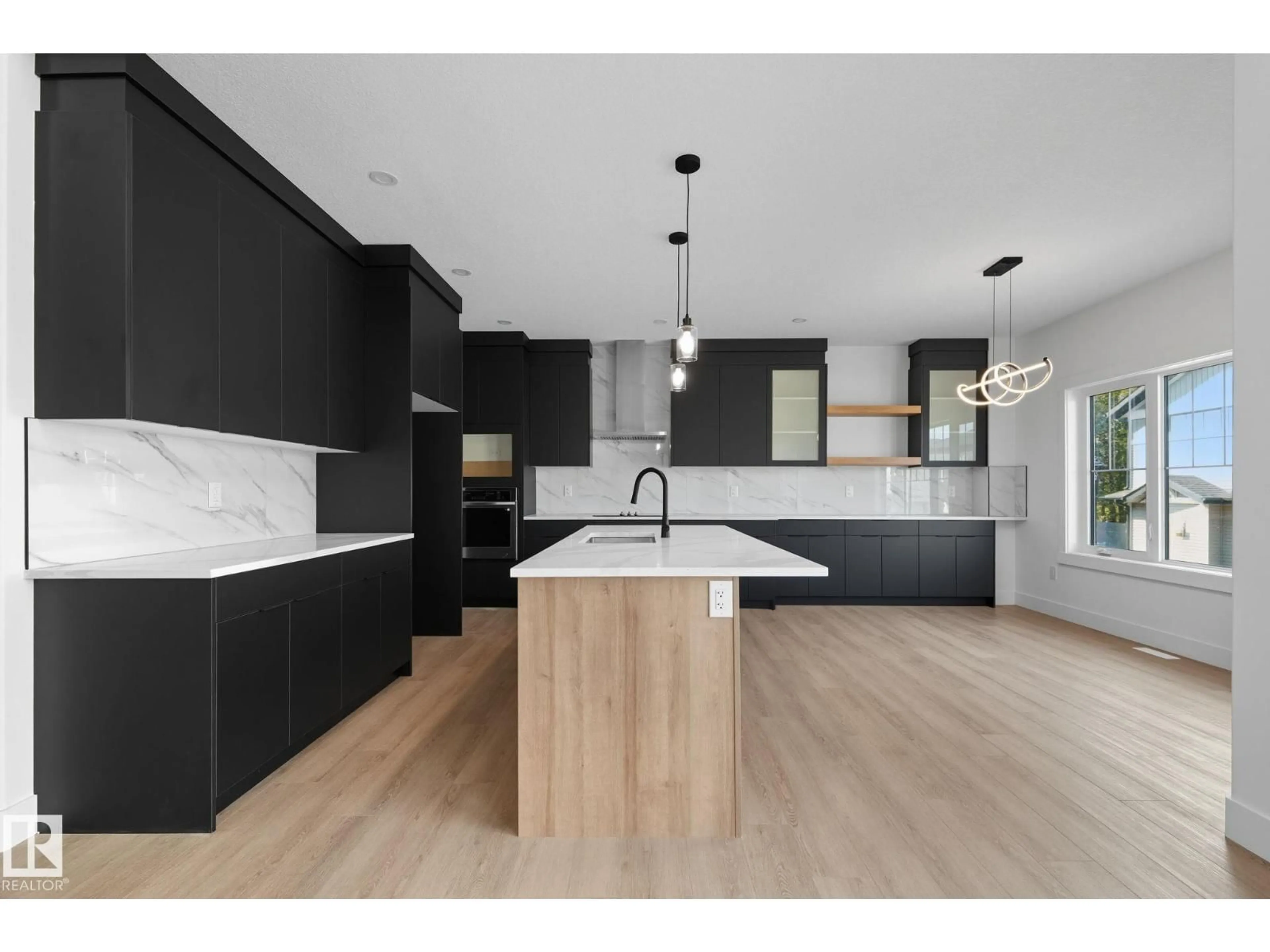 Open concept kitchen, unknown for 1135 GYRFALCON CR, Edmonton Alberta T5S0S5