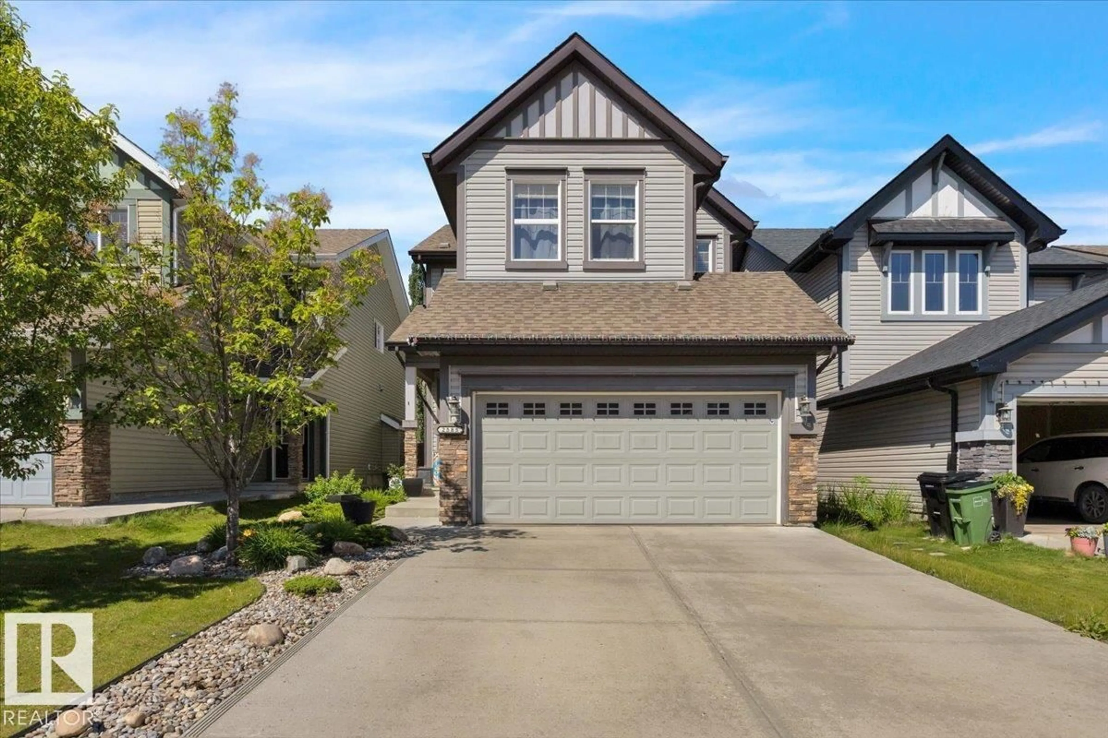 Home with vinyl exterior material, street for 2585 COLE CR, Edmonton Alberta T6W2A3