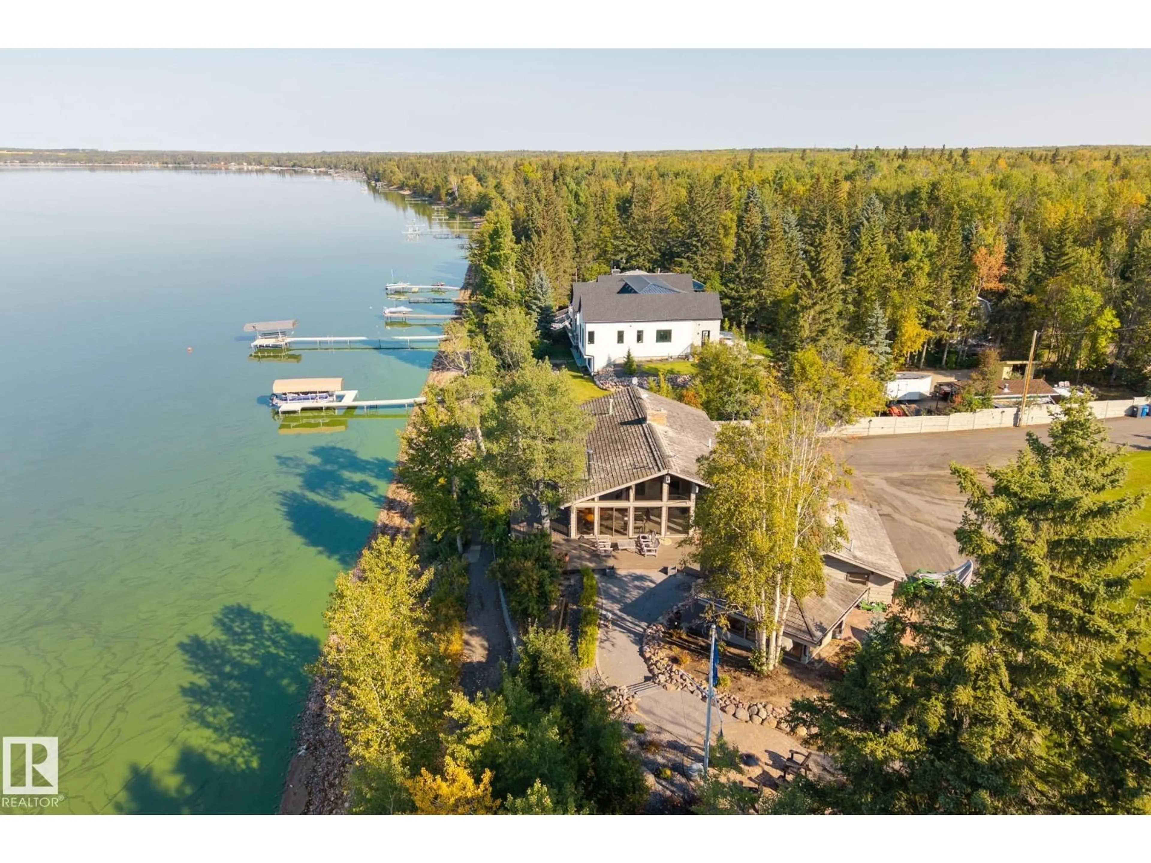 A pic from outside/outdoor area/front of a property/back of a property/a pic from drone, water/lake/river/ocean view for 139 SILVER BE, Rural Wetaskiwin County Alberta T0C2C0