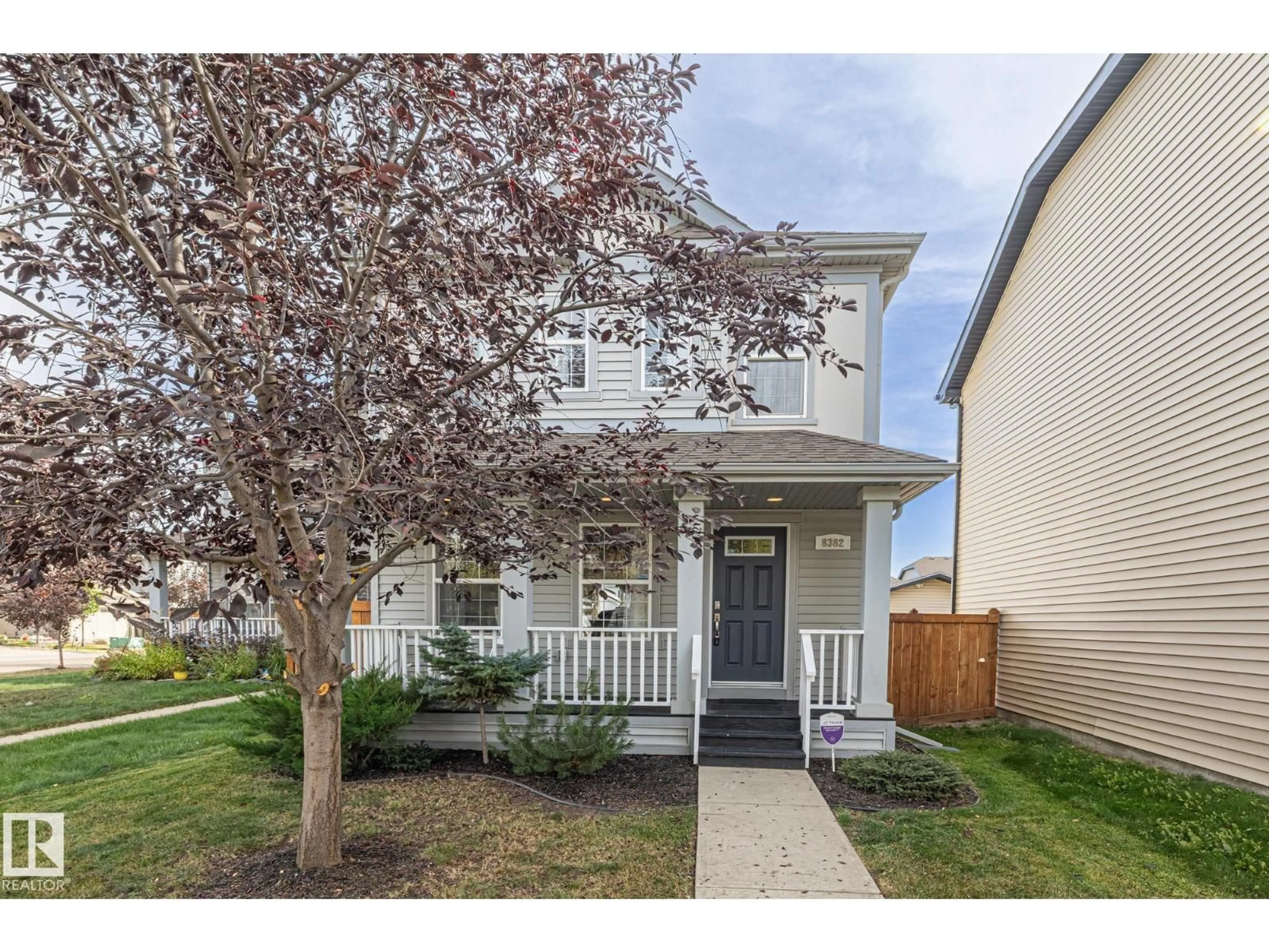 Home with vinyl exterior material, street for 8382 ELLIS CR, Edmonton Alberta T6M0P6