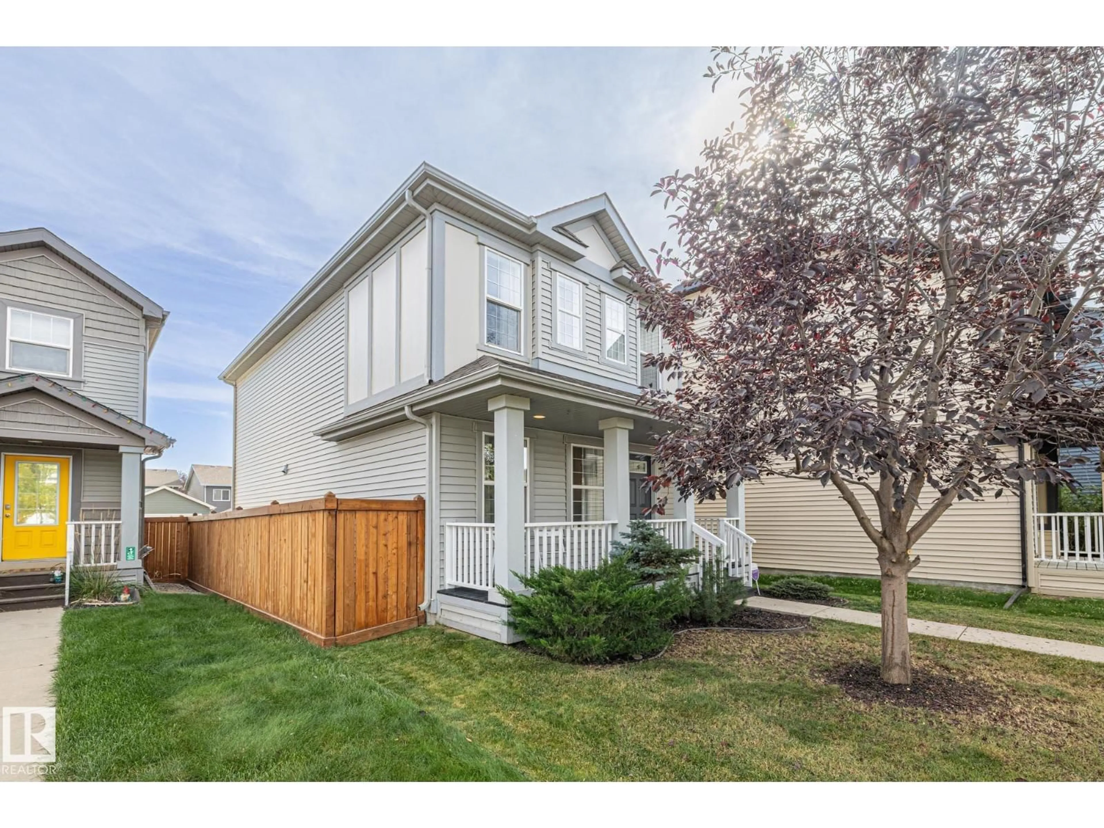 Home with vinyl exterior material, street for 8382 ELLIS CR, Edmonton Alberta T6M0P6