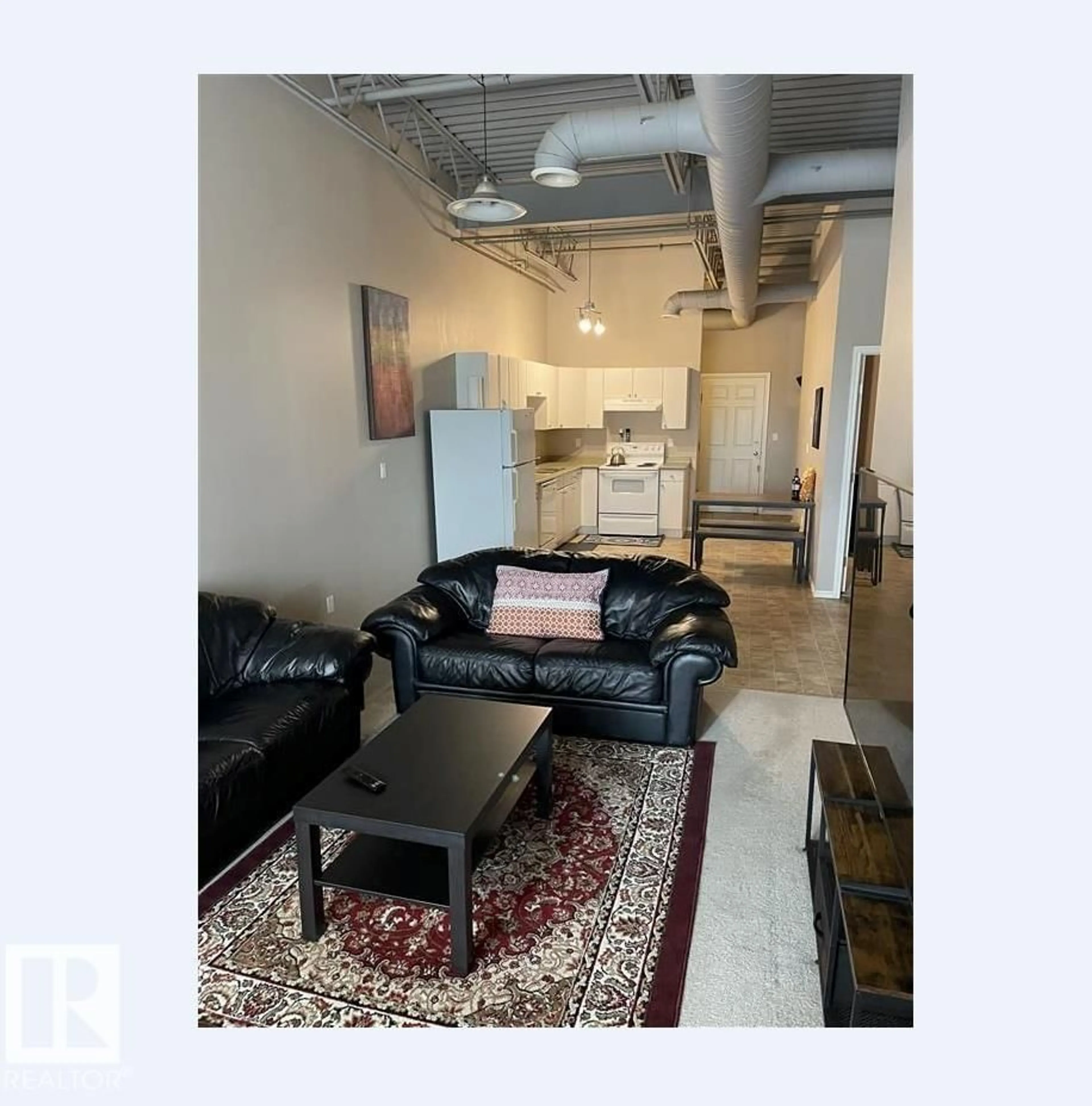 Living room with furniture, unknown for #211 - 9817 103 ST, Fort Saskatchewan Alberta T8L2C7
