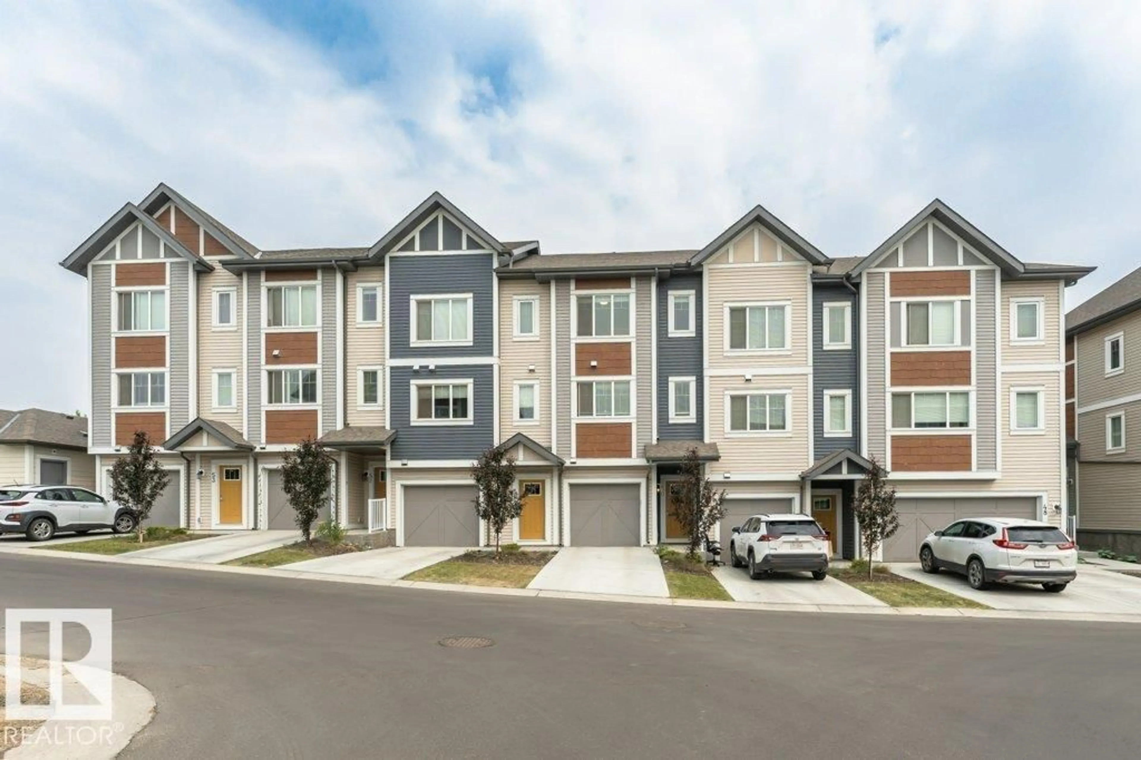 Home with vinyl exterior material, street for #50 - 320 SECORD BV, Edmonton Alberta T5T7E8