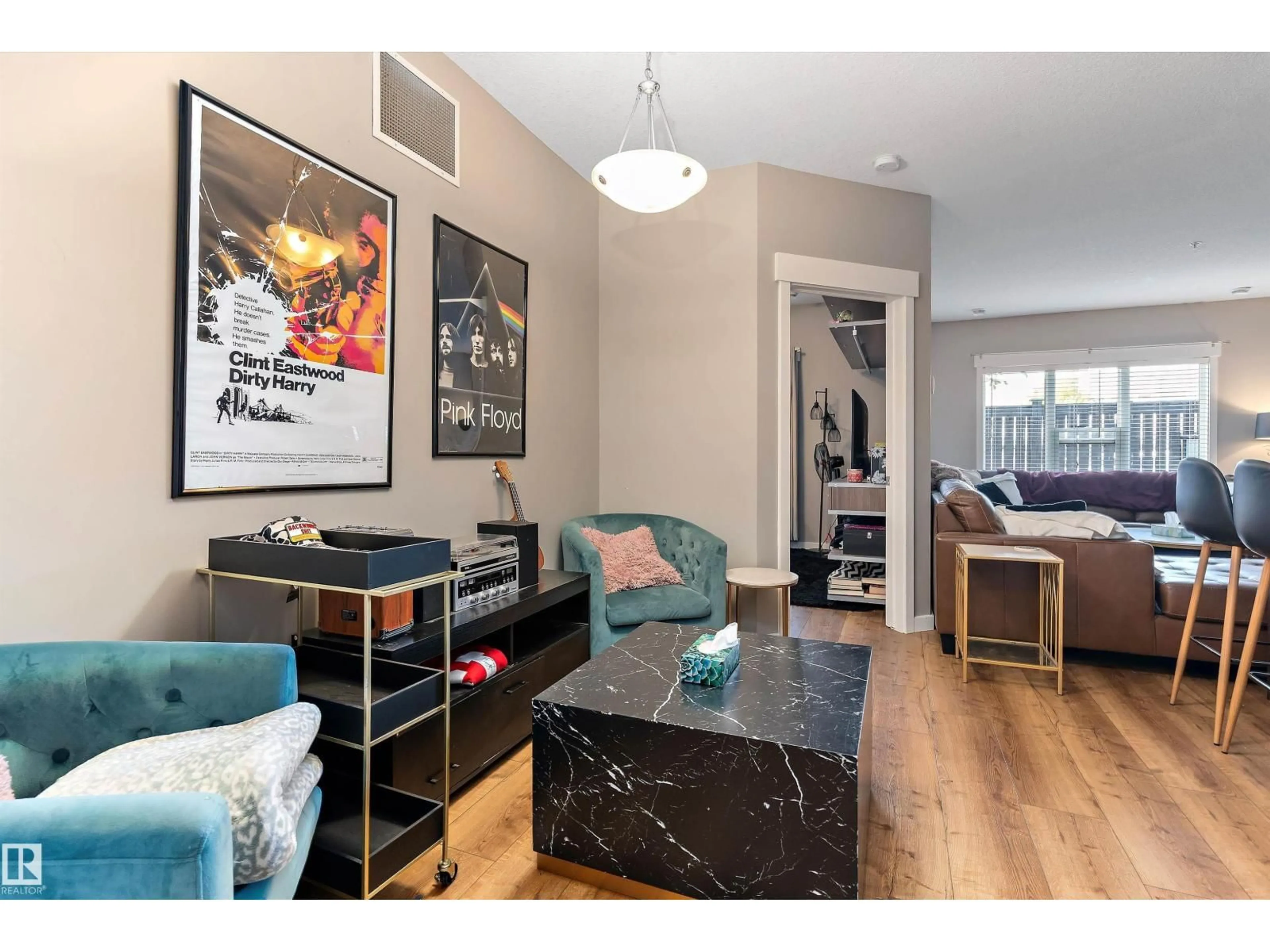 Living room with furniture, wood/laminate floor for #110 - 10518 113 ST, Edmonton Alberta T5H0C6