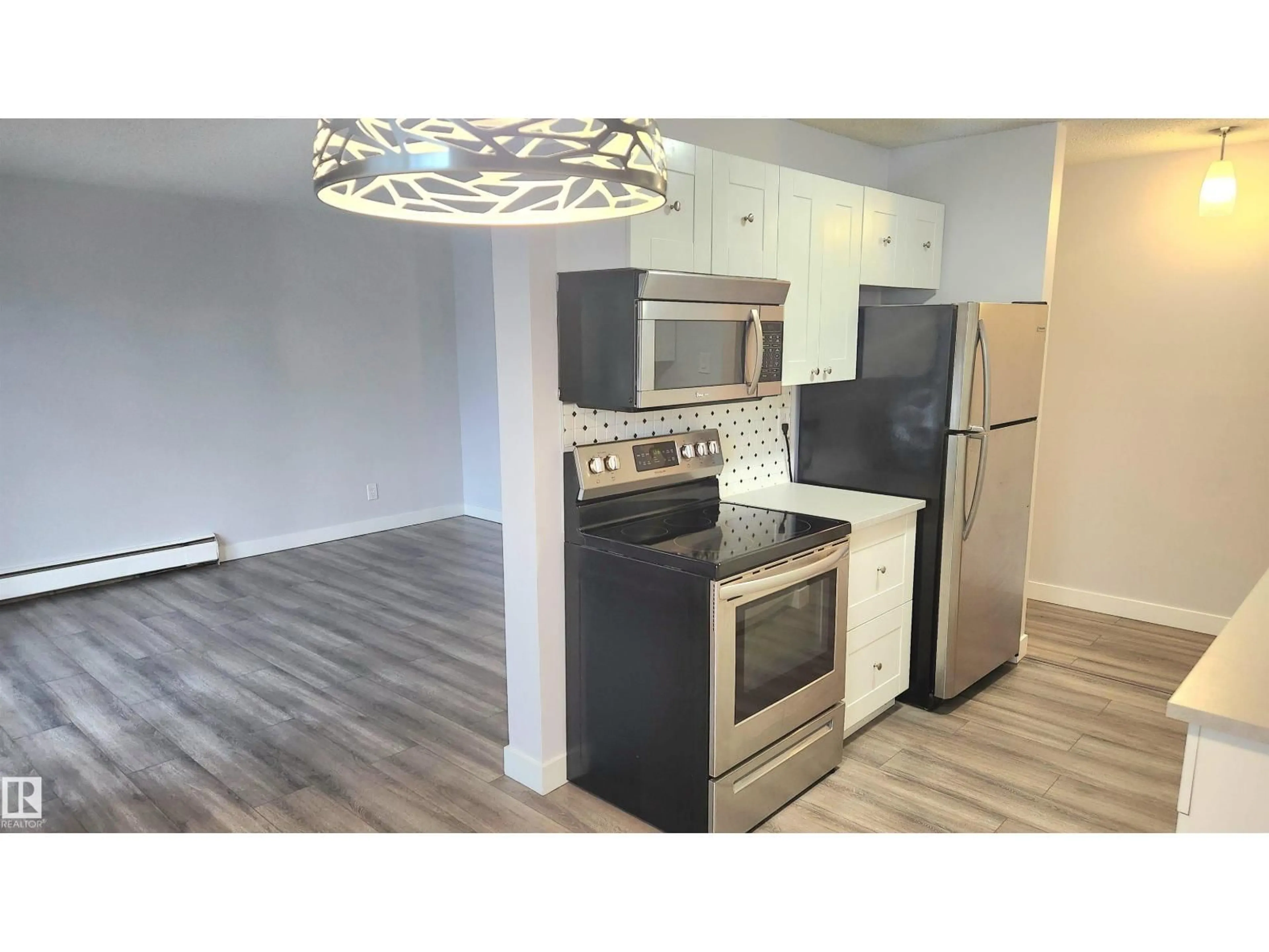Standard kitchen, wood/laminate floor for #304 - 10740 105 ST NW, Edmonton Alberta T5H2X2