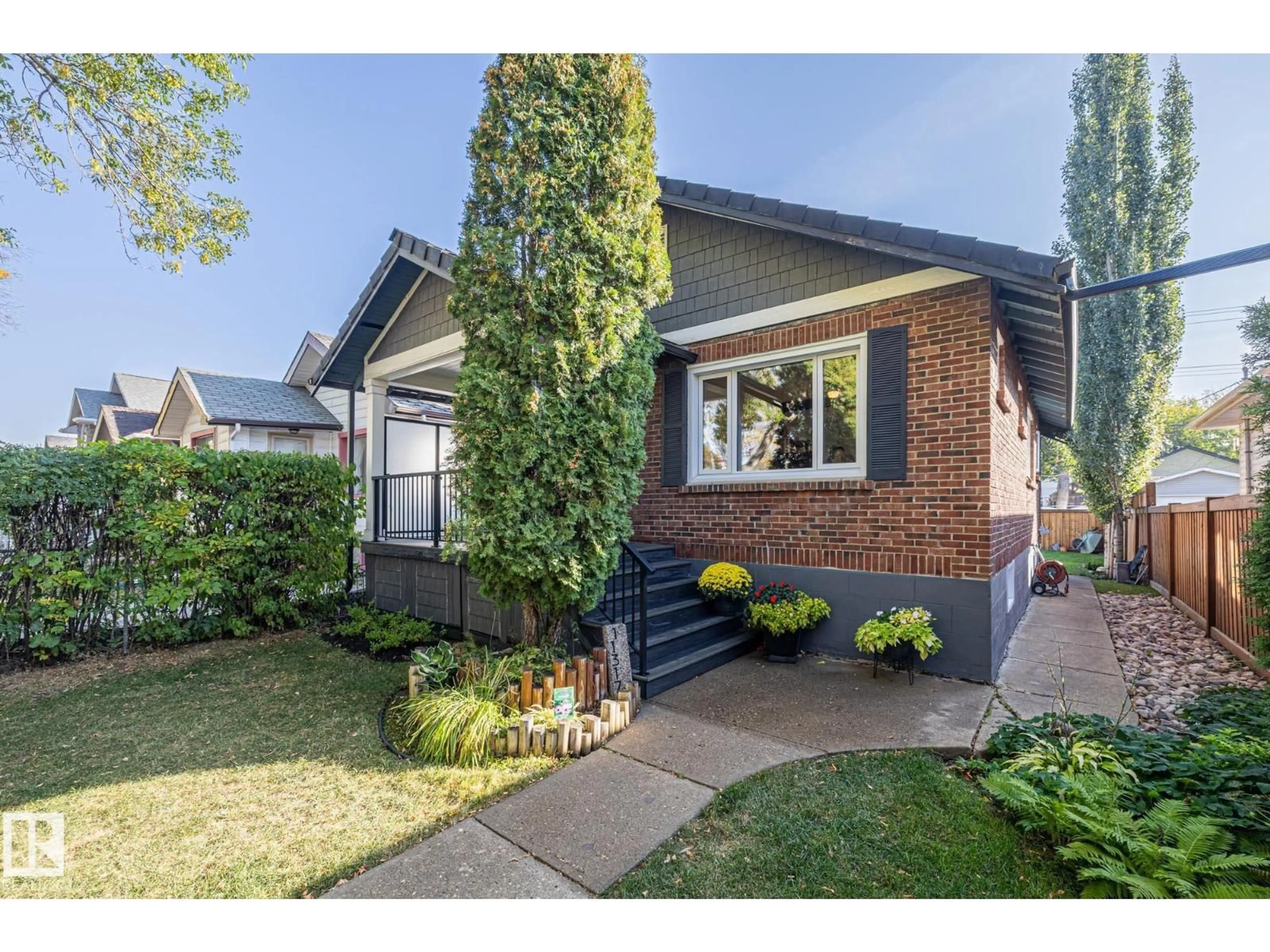 Home with brick exterior material, street for 11317 97 ST, Edmonton Alberta T5G1X3