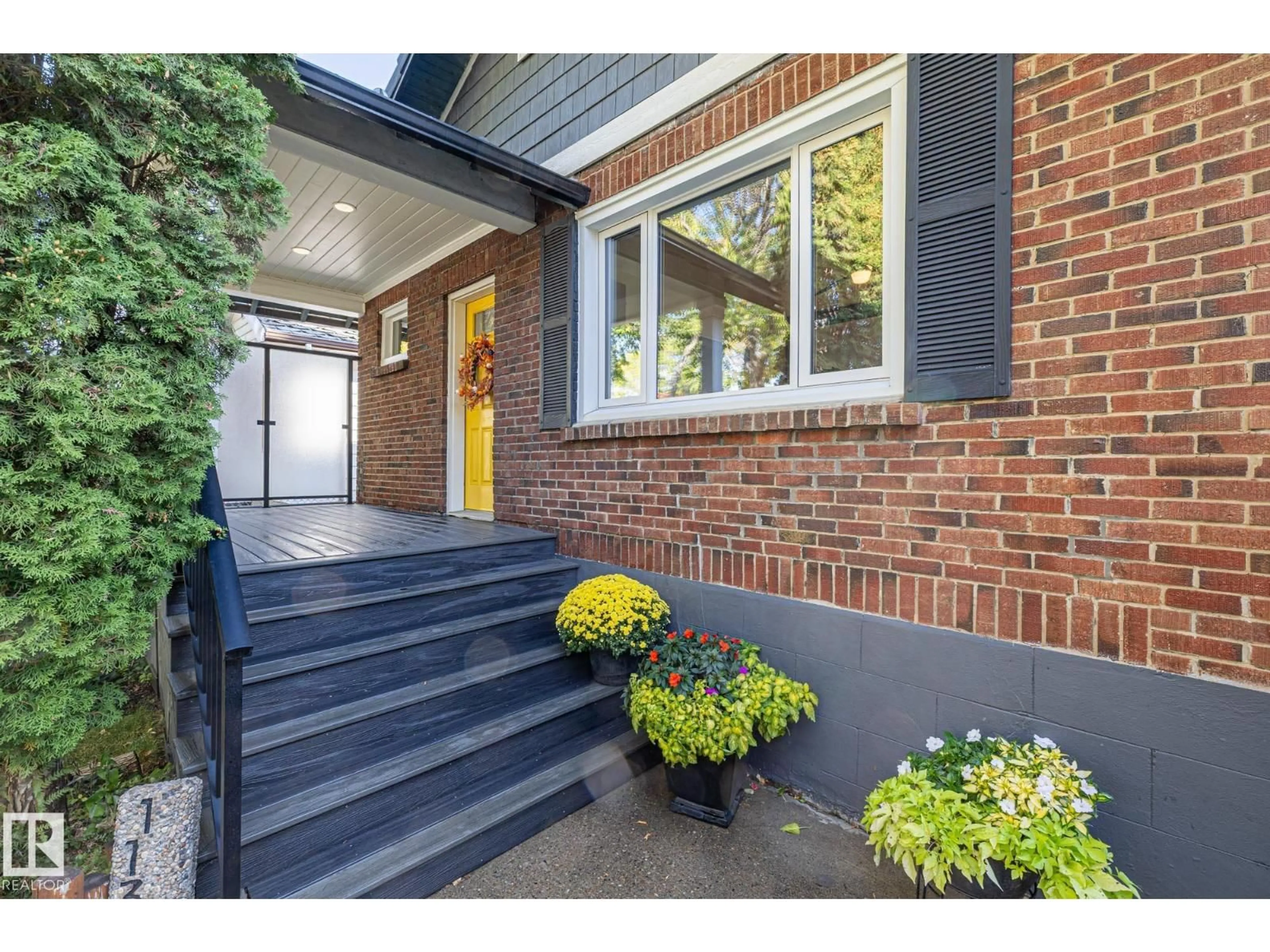 Home with brick exterior material, street for 11317 97 ST, Edmonton Alberta T5G1X3