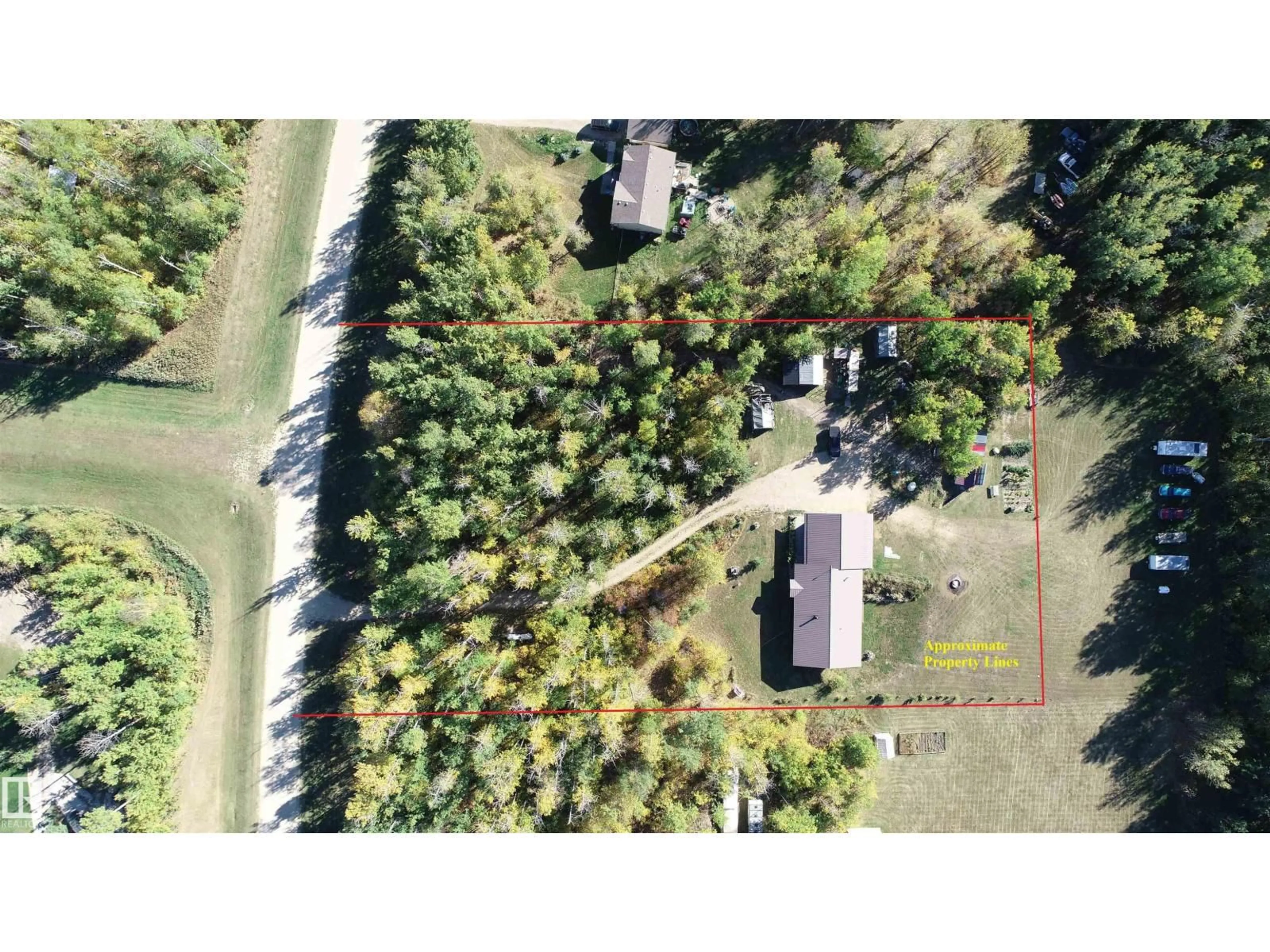 A pic from outside/outdoor area/front of a property/back of a property/a pic from drone, forest/trees view for 207 - 55108 RGE ROAD 15, Rural Lac Ste. Anne County Alberta T0E1V0