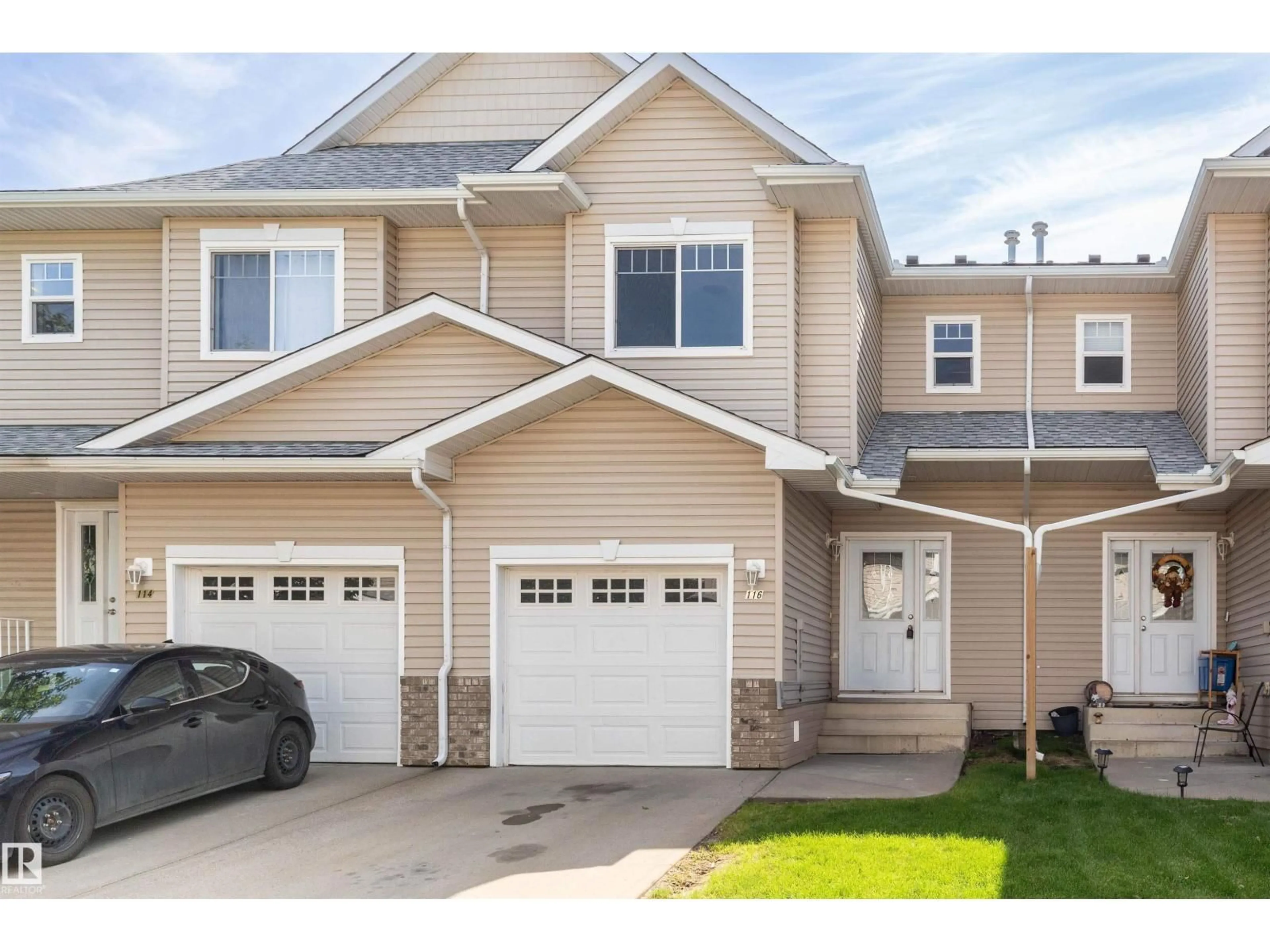 Home with vinyl exterior material, street for 116 5001 62 ST, Beaumont Alberta T4X0C7