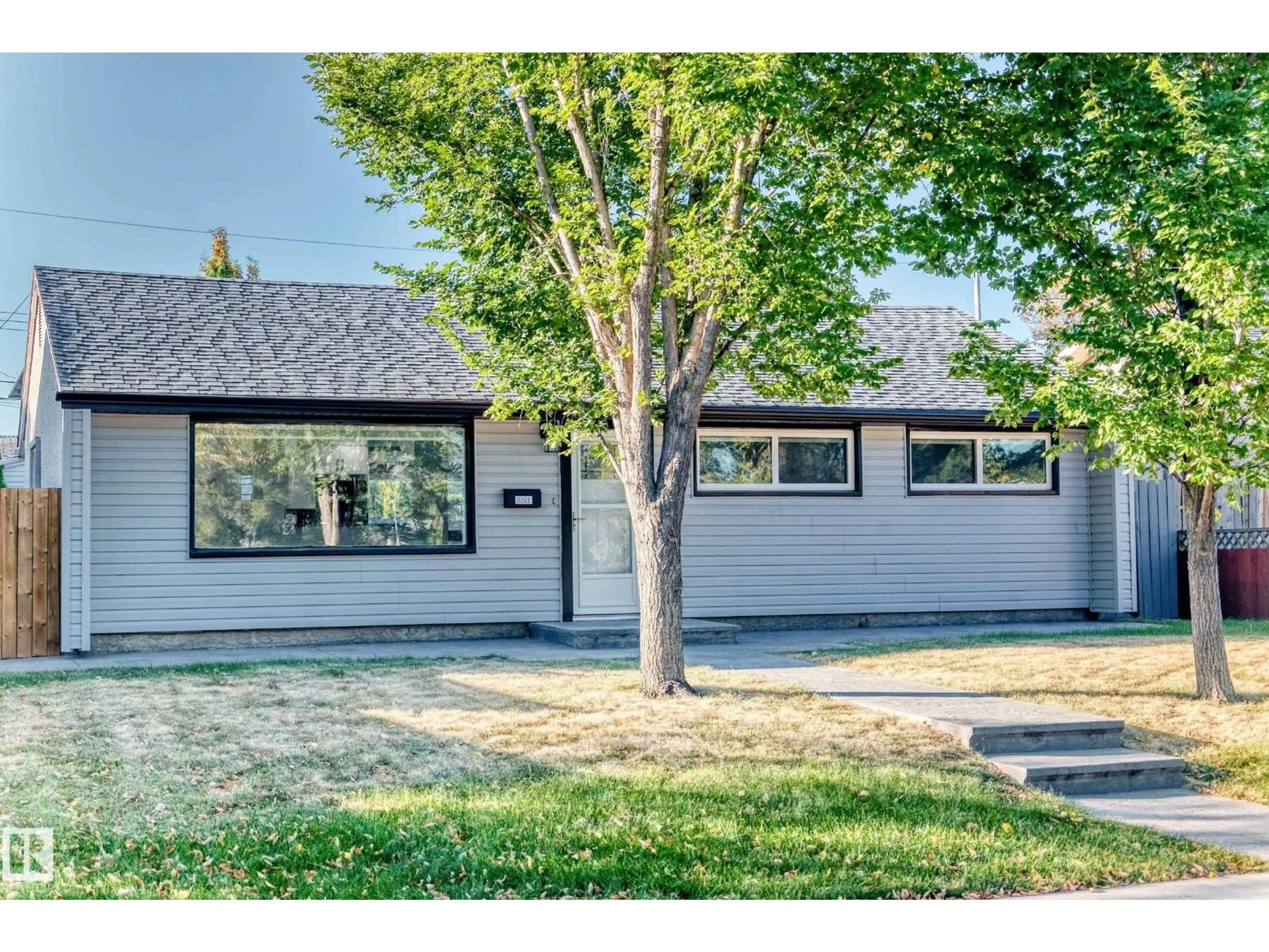 Home with vinyl exterior material, street for 8811 130A AV, Edmonton Alberta T5E0V7