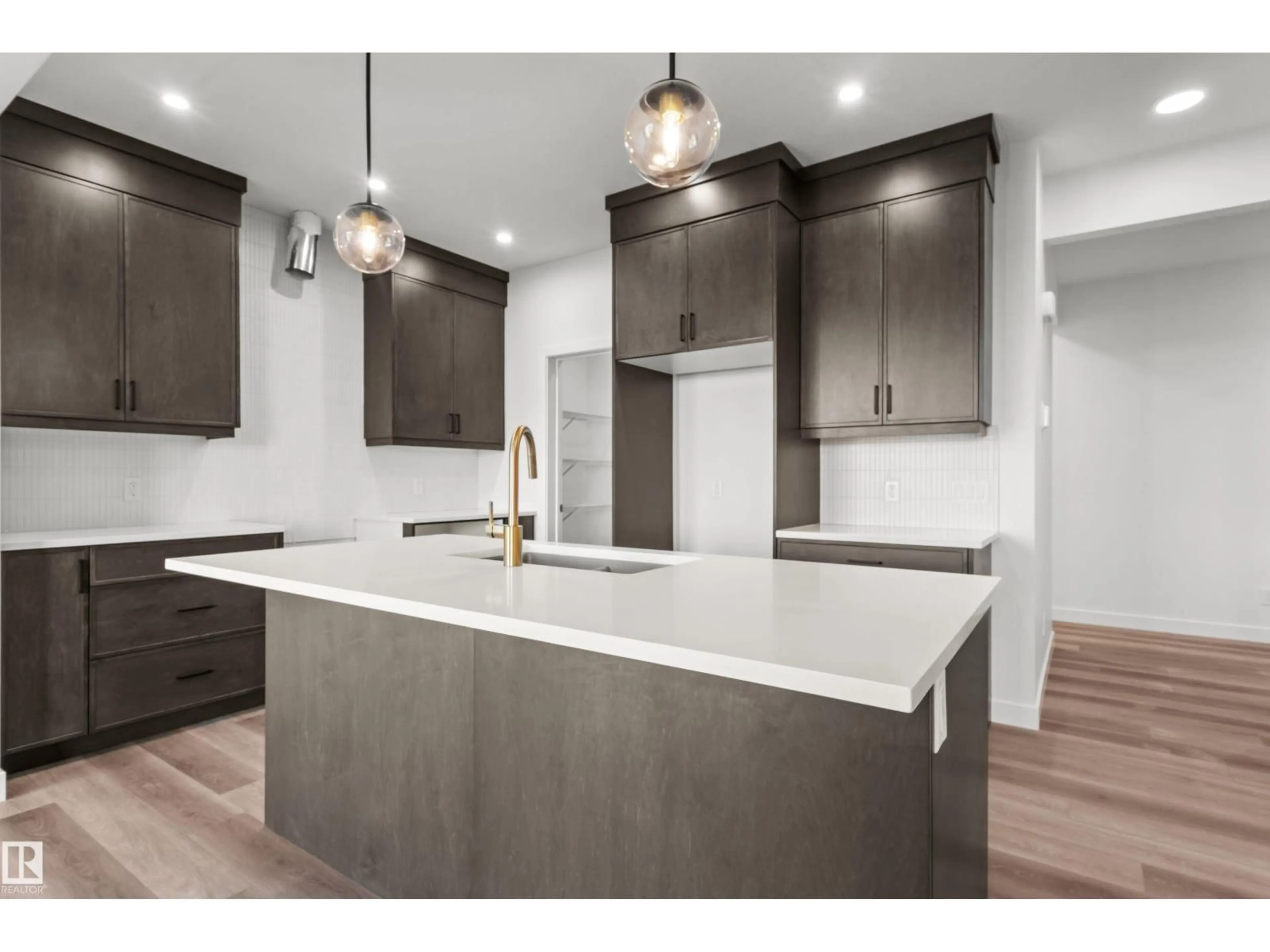 Open concept kitchen, unknown for SW - 2124 MUCKLEPLUM CR, Edmonton Alberta T6X3G9
