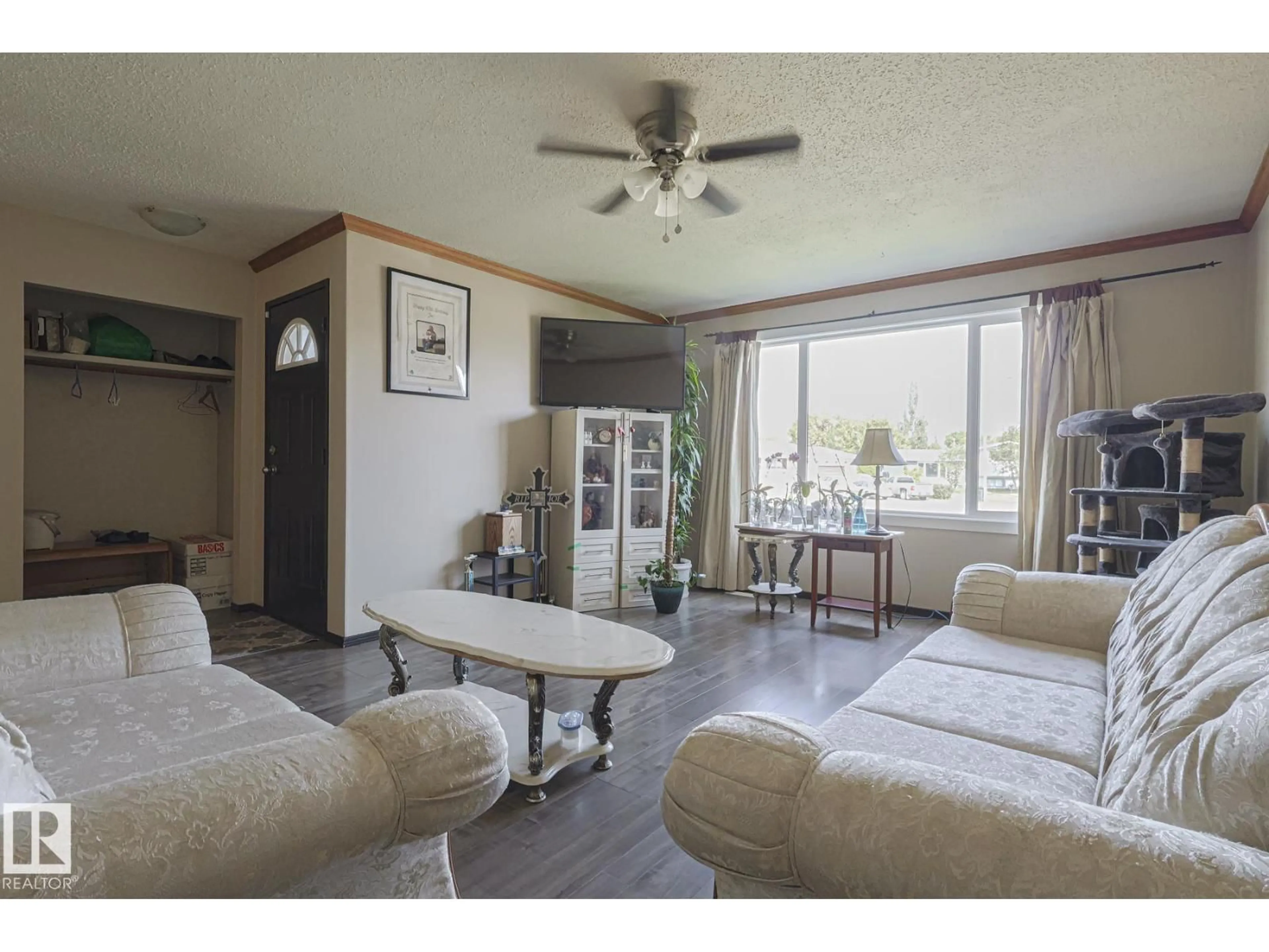 Living room with furniture, unknown for 128 CAMELOT AV, Leduc Alberta T9E4L1