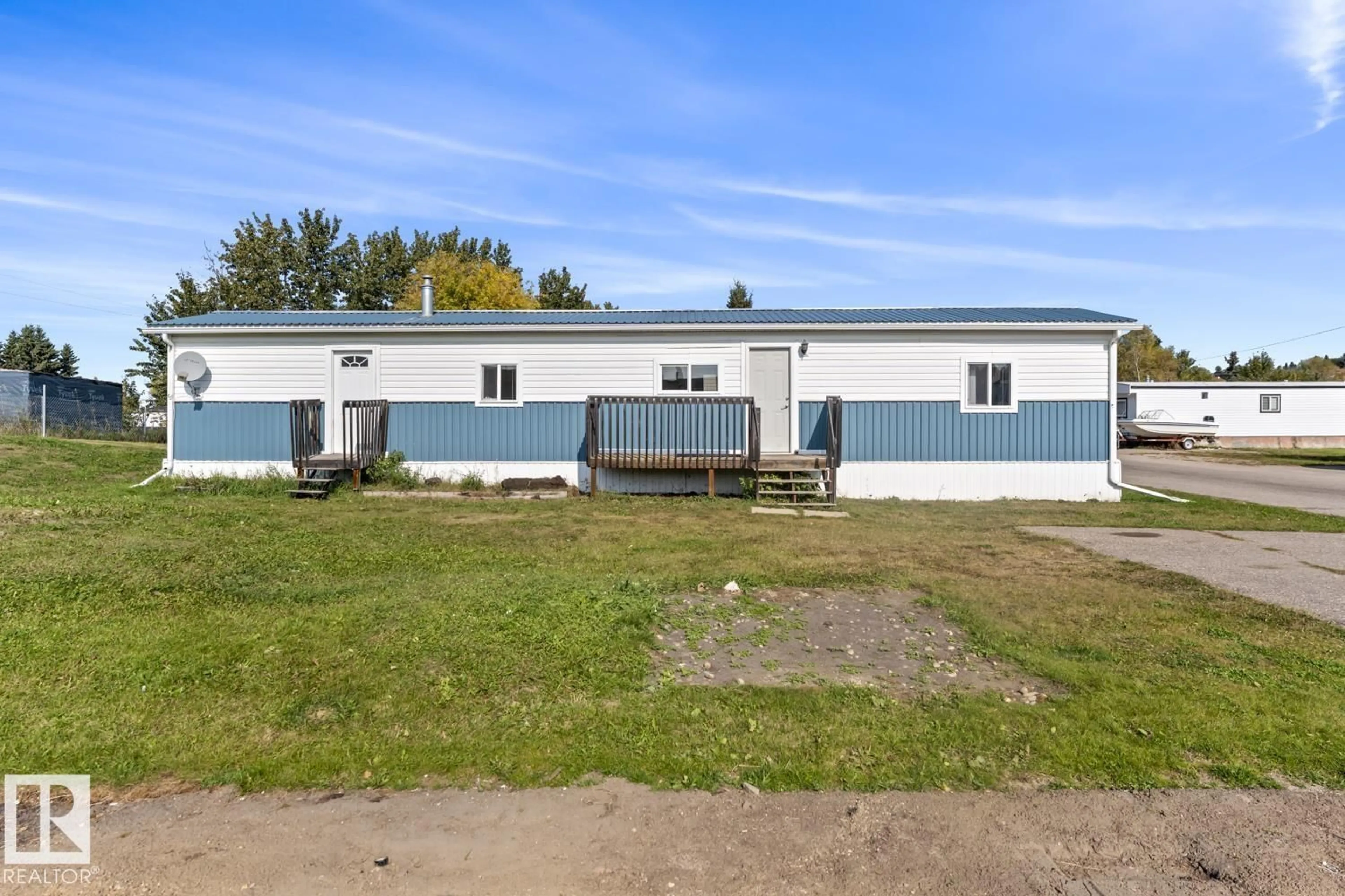 A pic from outside/outdoor area/front of a property/back of a property/a pic from drone, building for 63 4405 50 AV, Cold Lake Alberta T9M1Z4