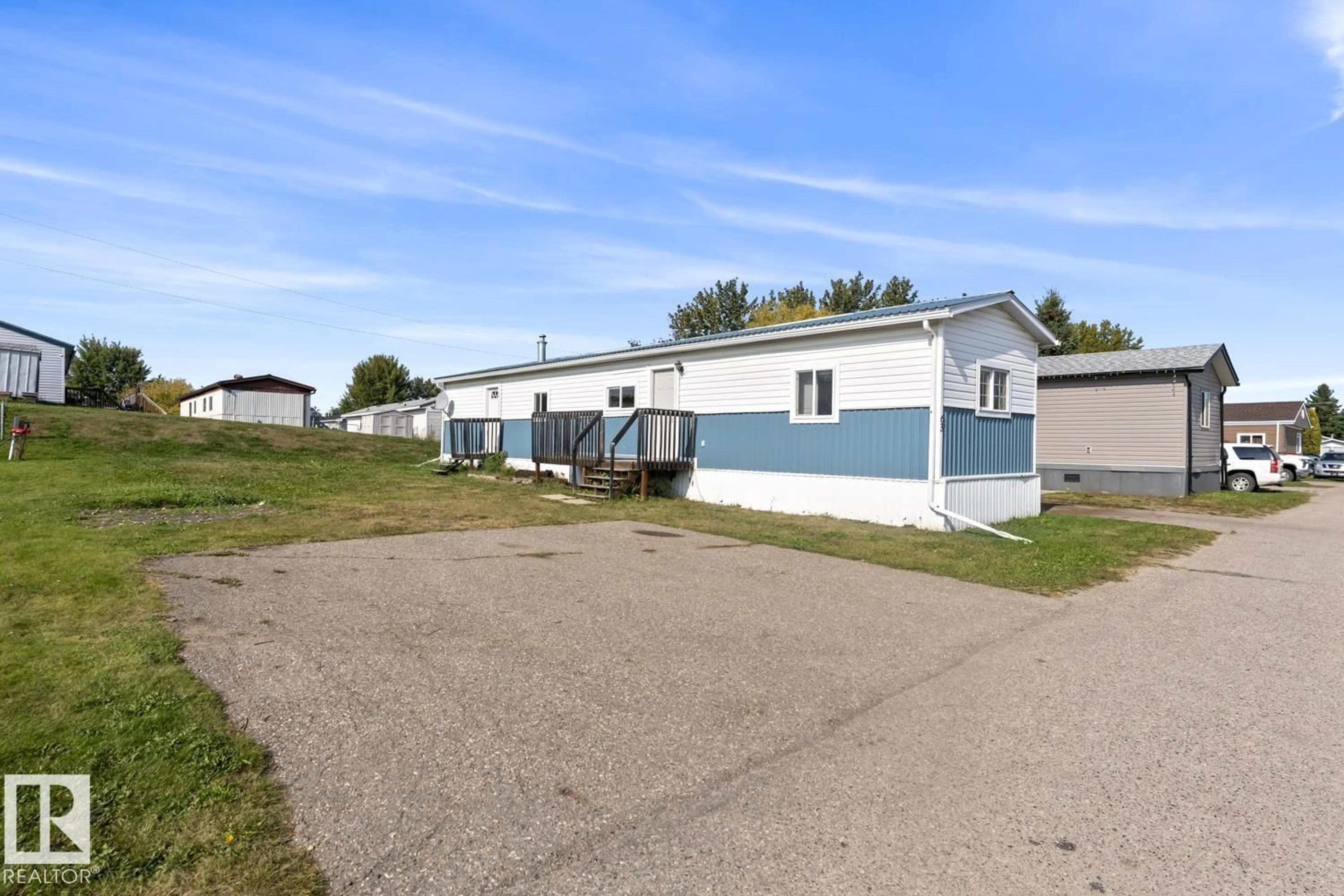 A pic from outside/outdoor area/front of a property/back of a property/a pic from drone, building for 63 4405 50 AV, Cold Lake Alberta T9M1Z4