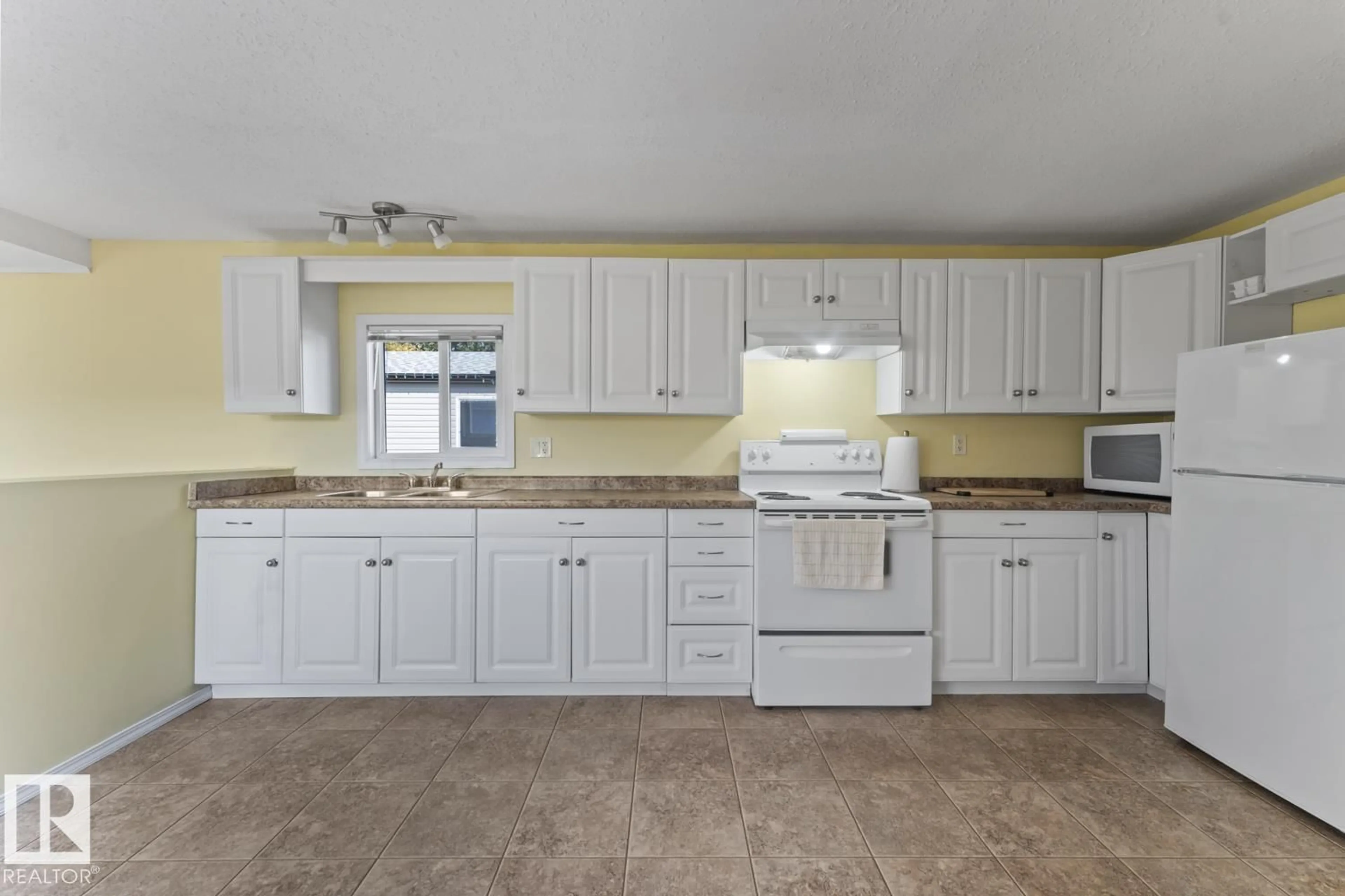 Standard kitchen, ceramic/tile floor for 63 4405 50 AV, Cold Lake Alberta T9M1Z4