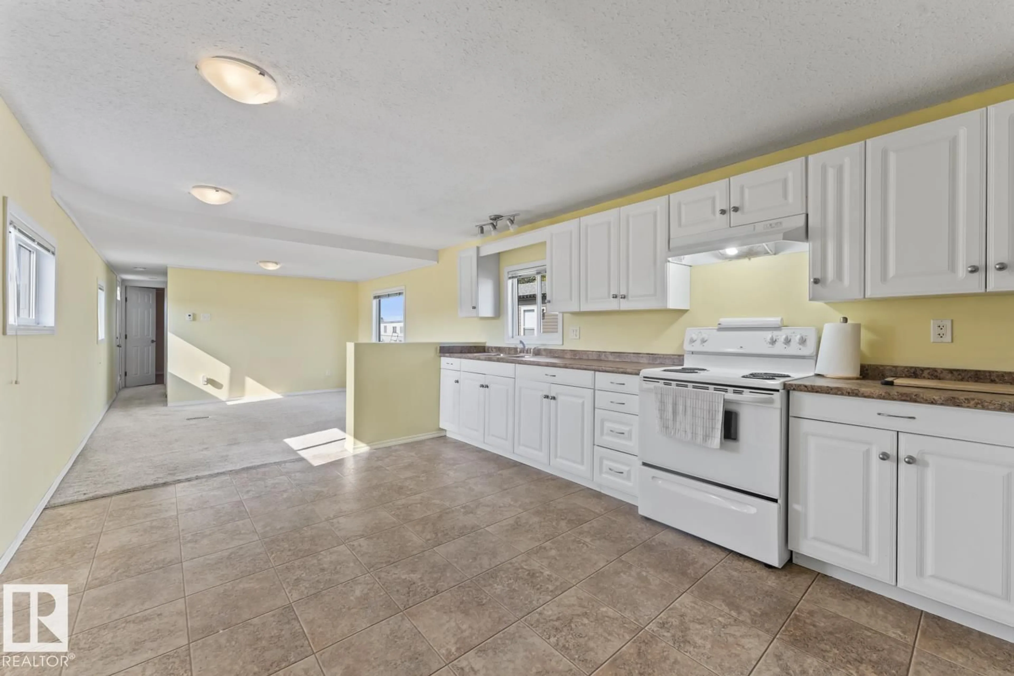 Open concept kitchen, ceramic/tile floor for 63 4405 50 AV, Cold Lake Alberta T9M1Z4