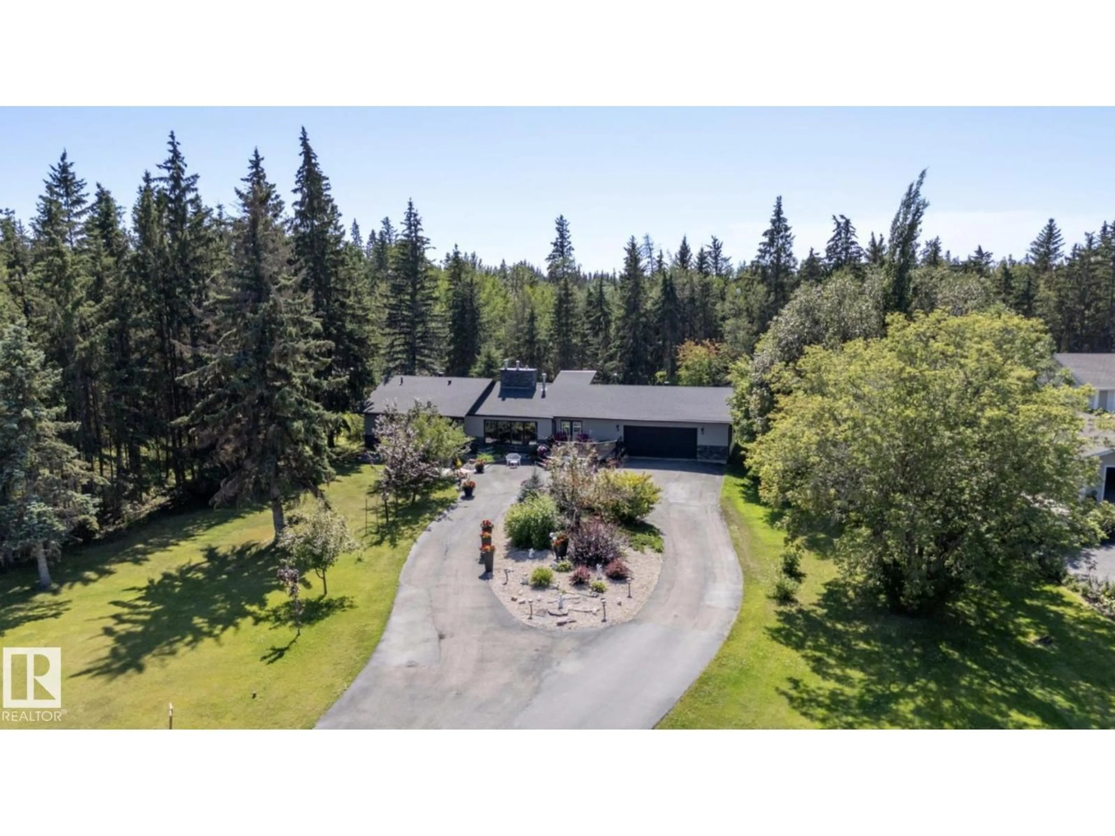 A pic from outside/outdoor area/front of a property/back of a property/a pic from drone, unknown for 32 SILVER CHIEF, Rural Sturgeon County Alberta T8N1M8