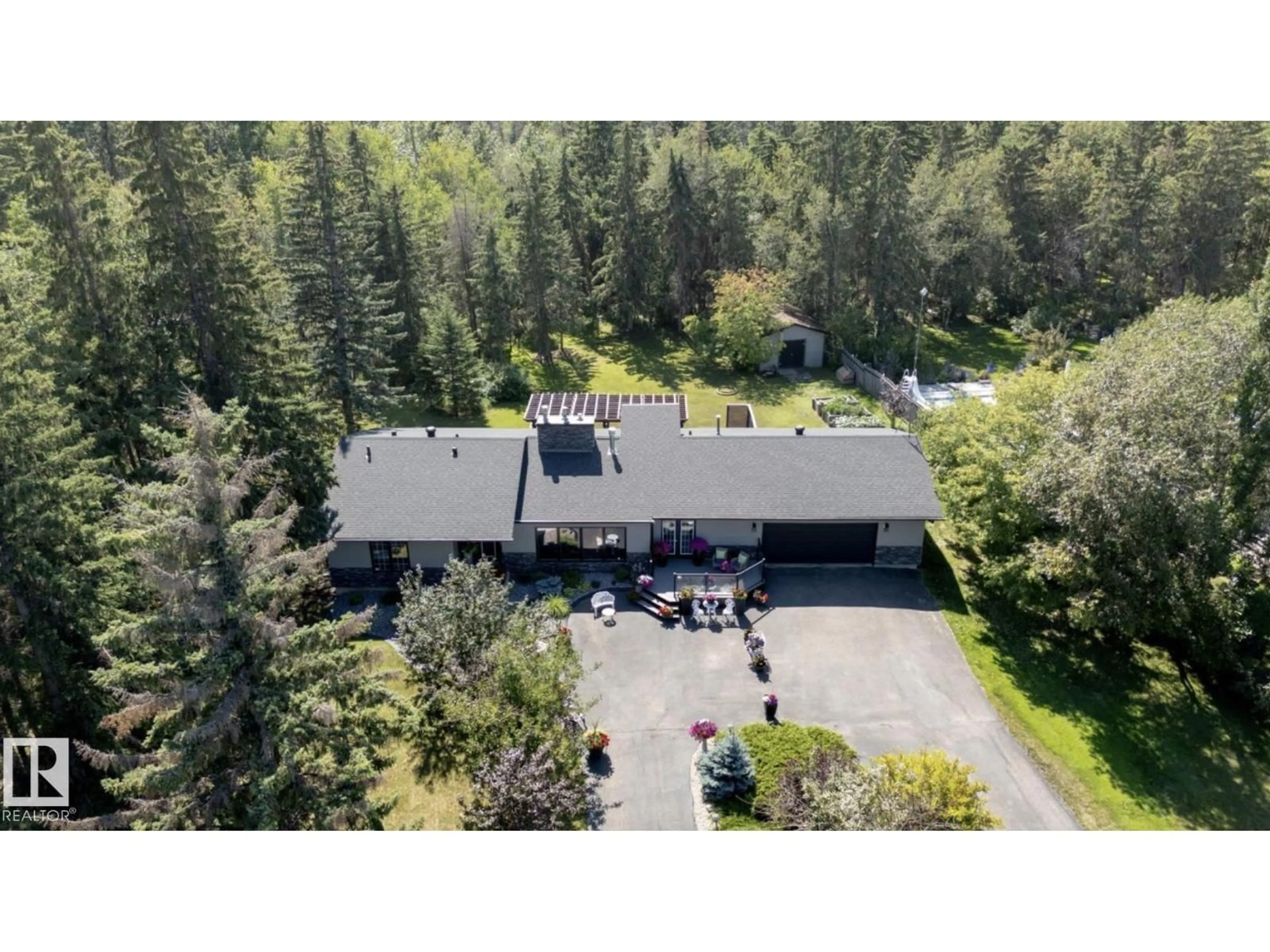 A pic from outside/outdoor area/front of a property/back of a property/a pic from drone, unknown for 32 SILVER CHIEF, Rural Sturgeon County Alberta T8N1M8