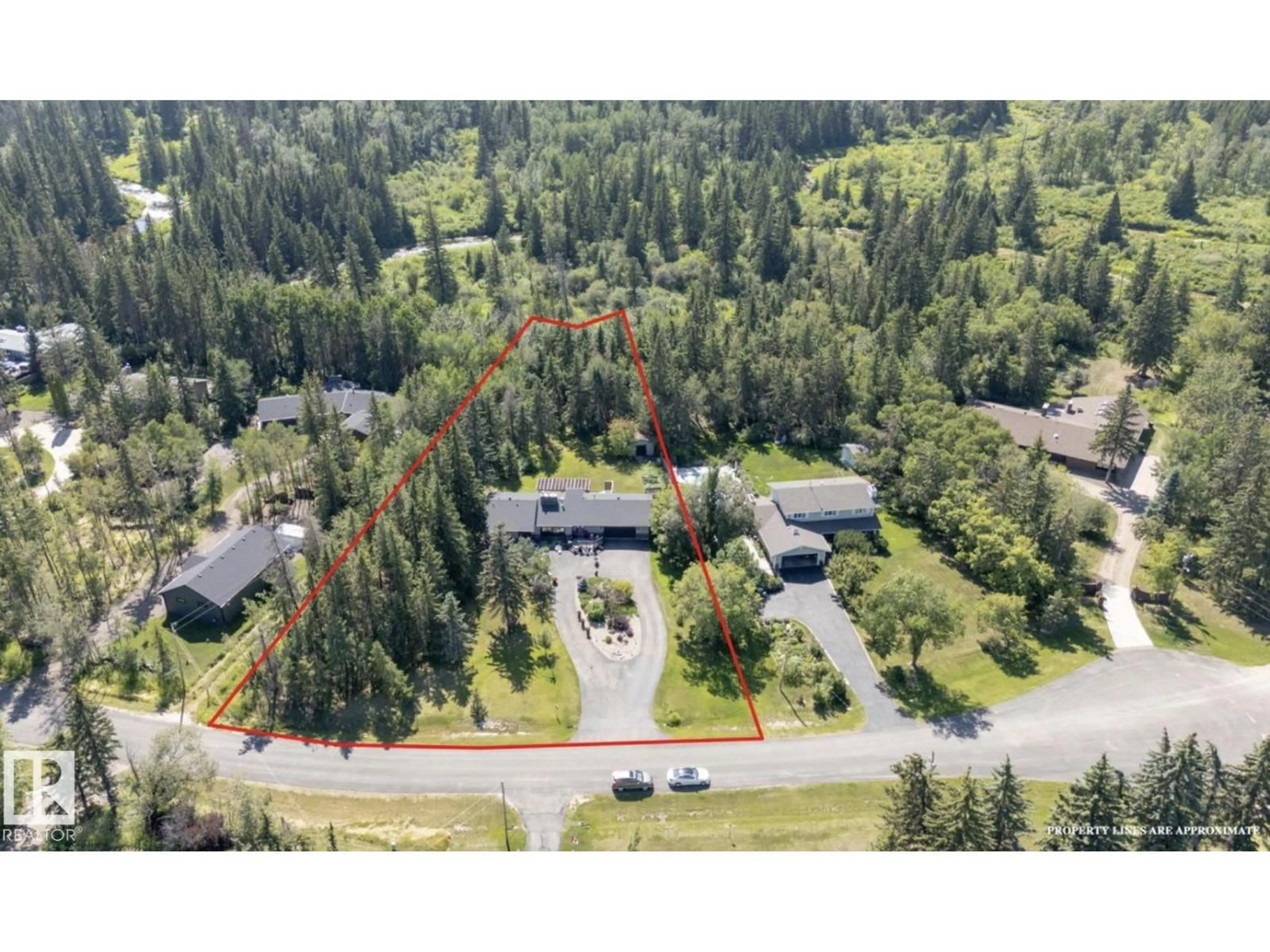 A pic from outside/outdoor area/front of a property/back of a property/a pic from drone, unknown for 32 SILVER CHIEF, Rural Sturgeon County Alberta T8N1M8