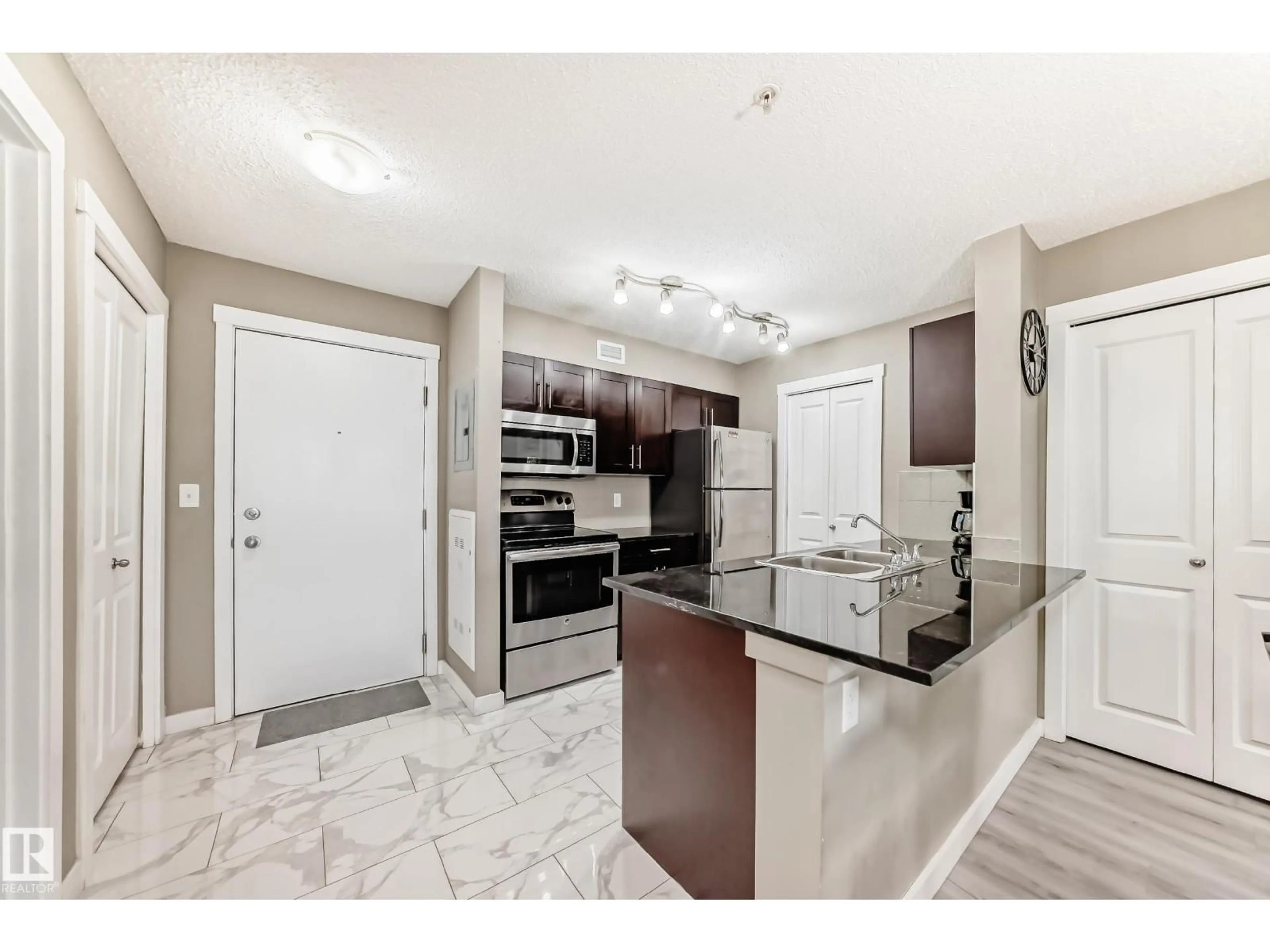 Open concept kitchen, ceramic/tile floor for 5804 - 118 MULLEN PLACE, Edmonton Alberta T6R0W3