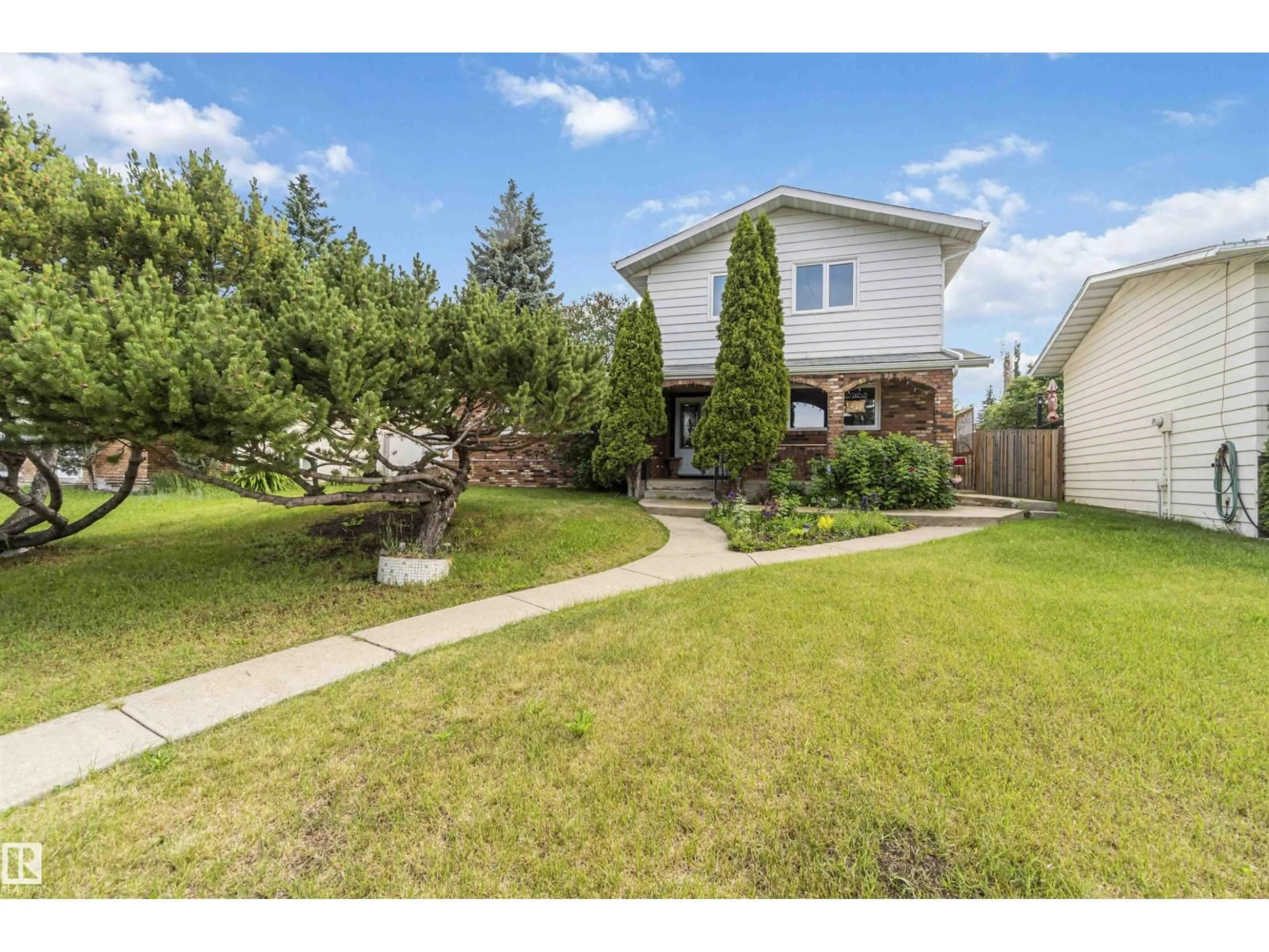 A pic from outside/outdoor area/front of a property/back of a property/a pic from drone, street for 1412 KNOTTWOOD RD, Edmonton Alberta T6K2J9