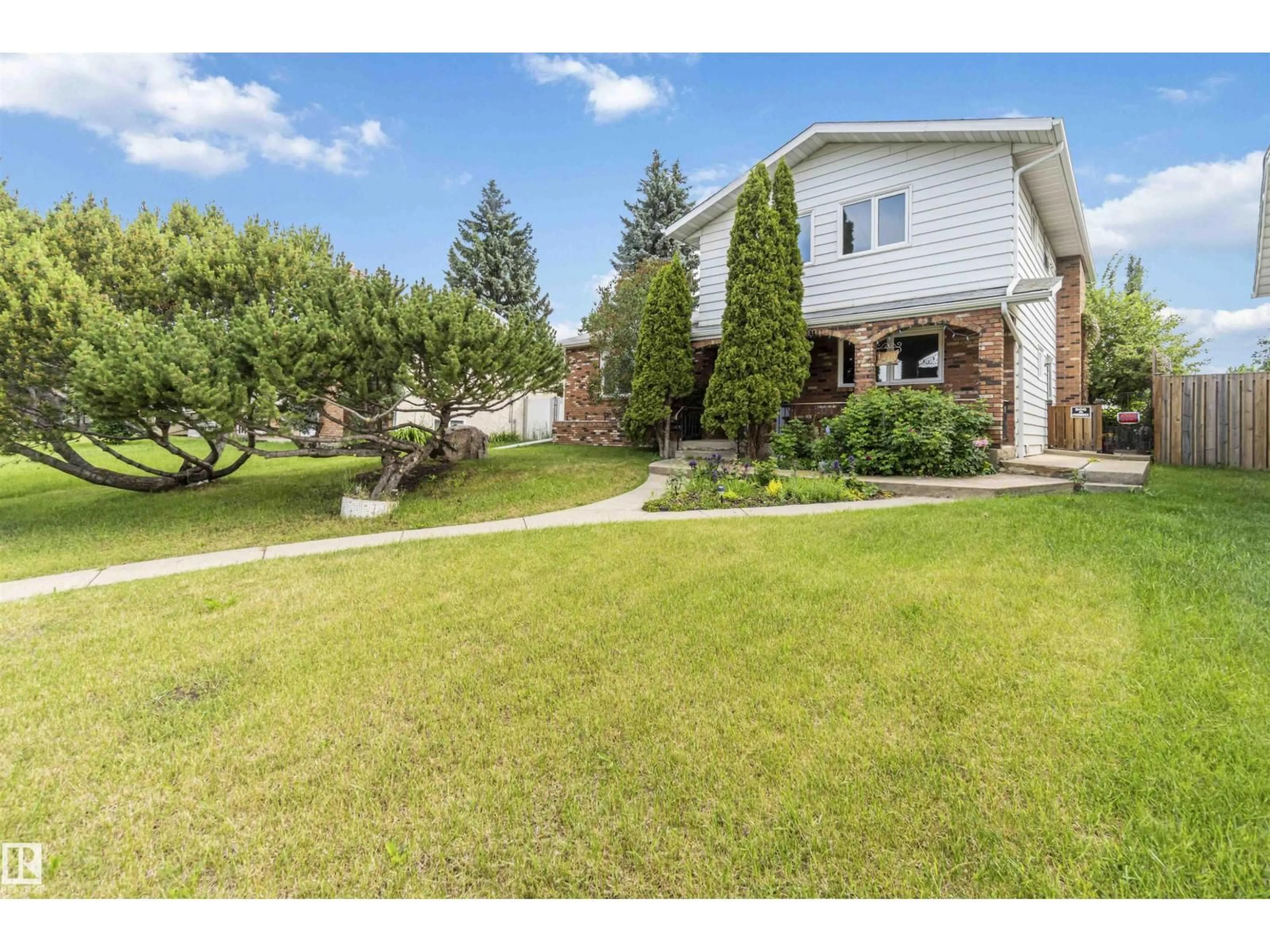 A pic from outside/outdoor area/front of a property/back of a property/a pic from drone, street for 1412 KNOTTWOOD RD, Edmonton Alberta T6K2J9