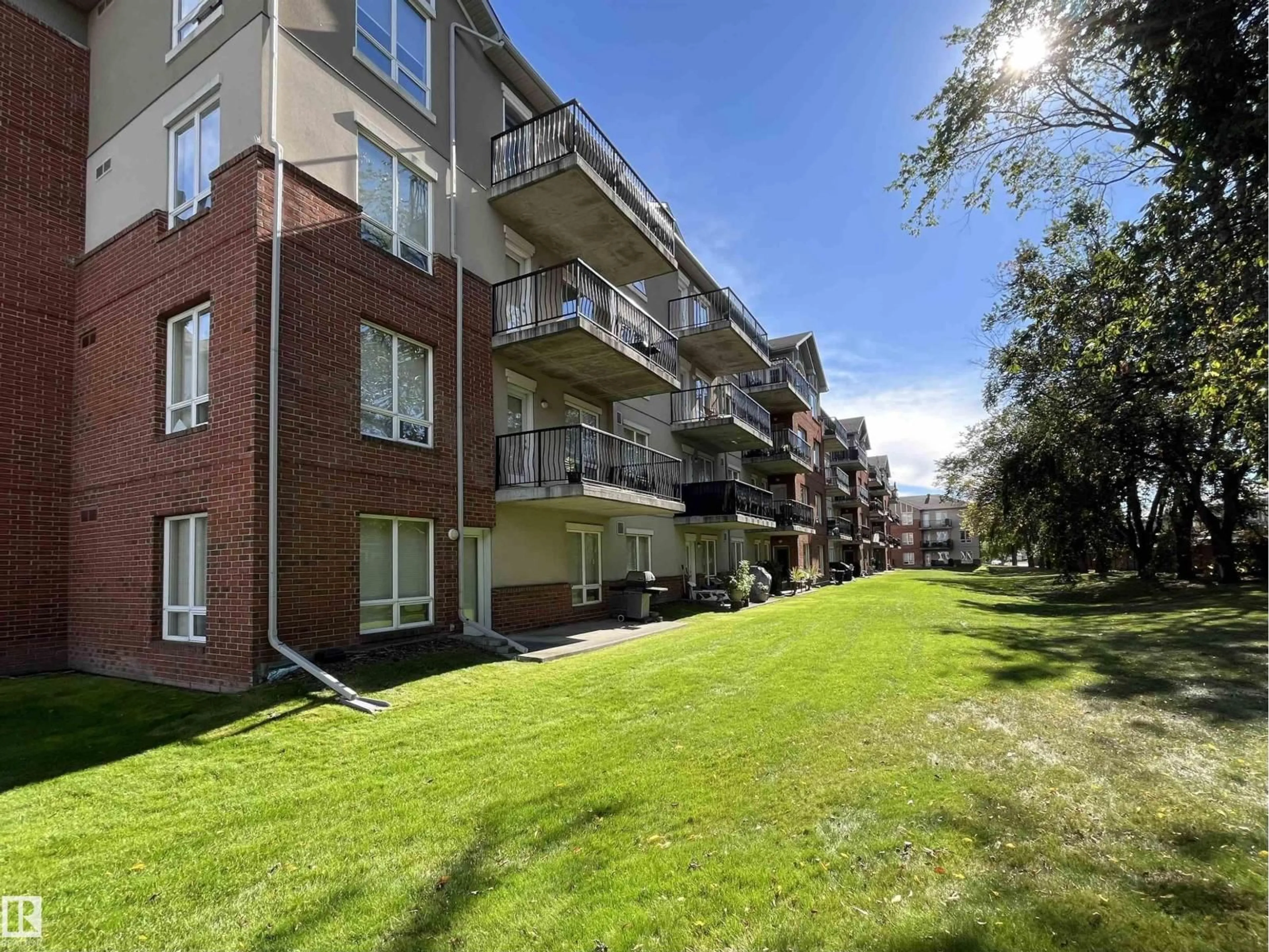 Patio, street for #211 - 6315 135 AV, Edmonton Alberta T5A5J7