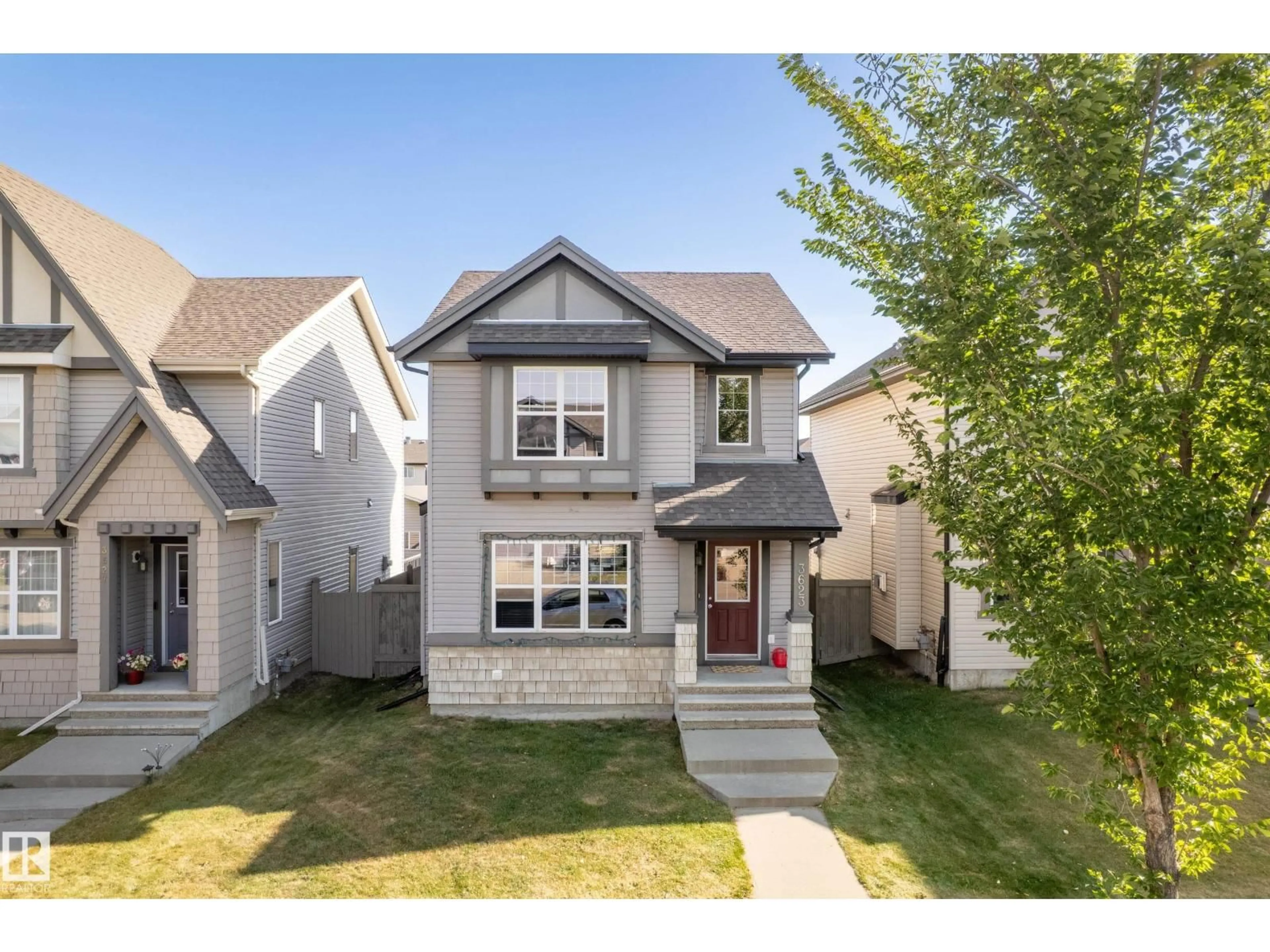 Home with vinyl exterior material, street for 3623 13 ST, Edmonton Alberta T6T0J5