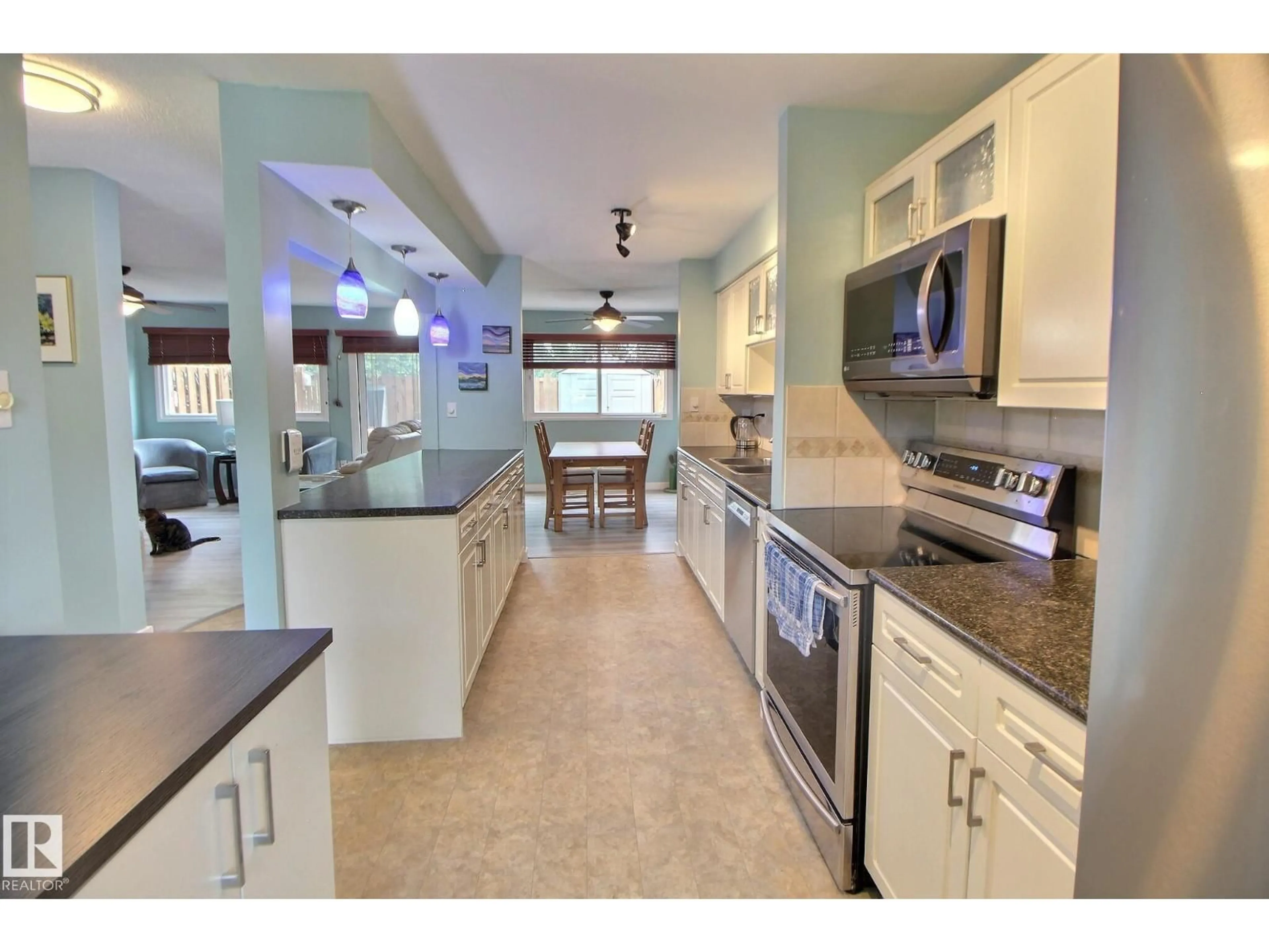 Open concept kitchen, ceramic/tile floor for 49 ROYAL RD, Edmonton Alberta T6J2E7