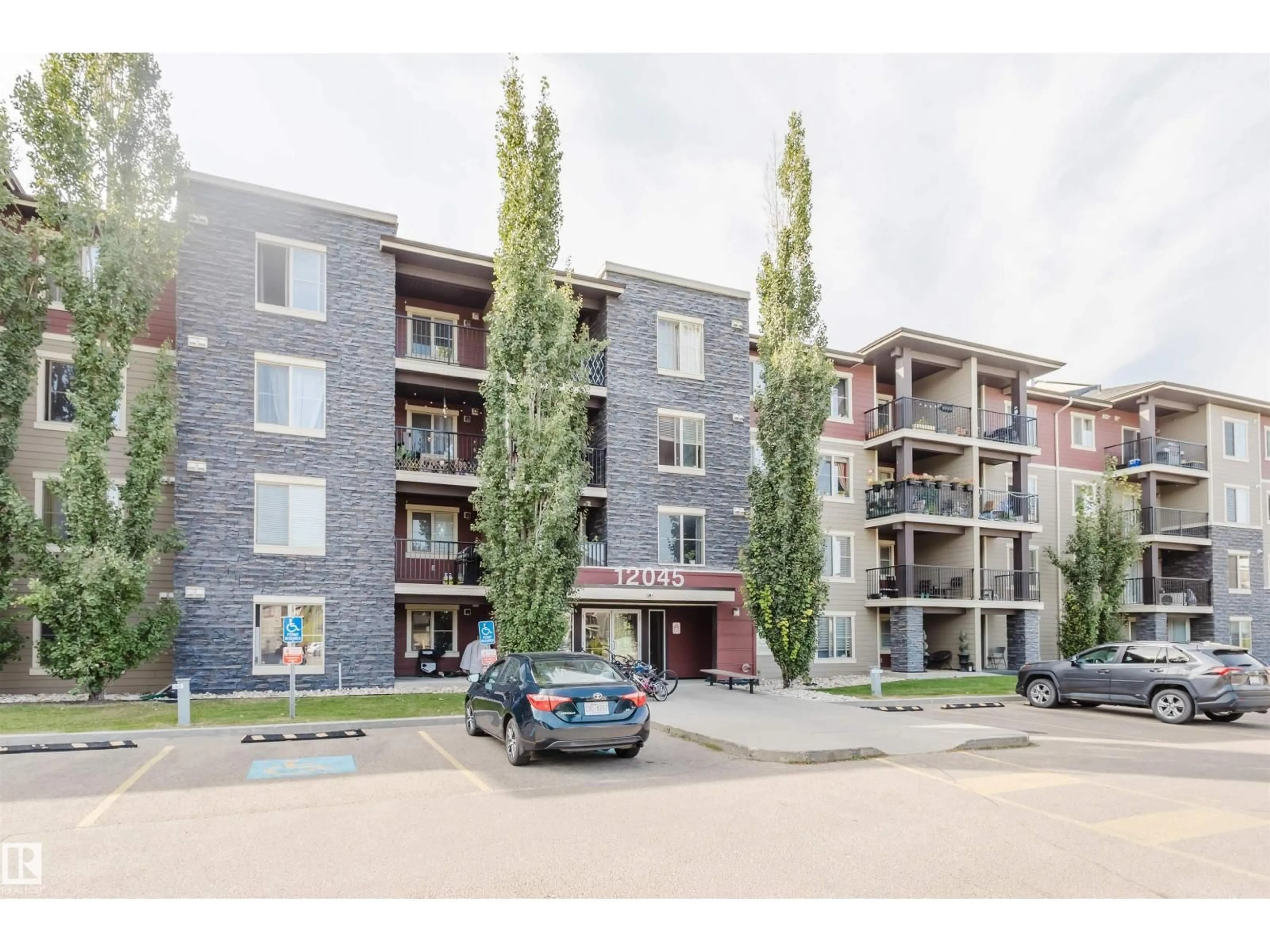 A pic from outside/outdoor area/front of a property/back of a property/a pic from drone, building for #301 - 12045 22 AV, Edmonton Alberta T6W2Y2