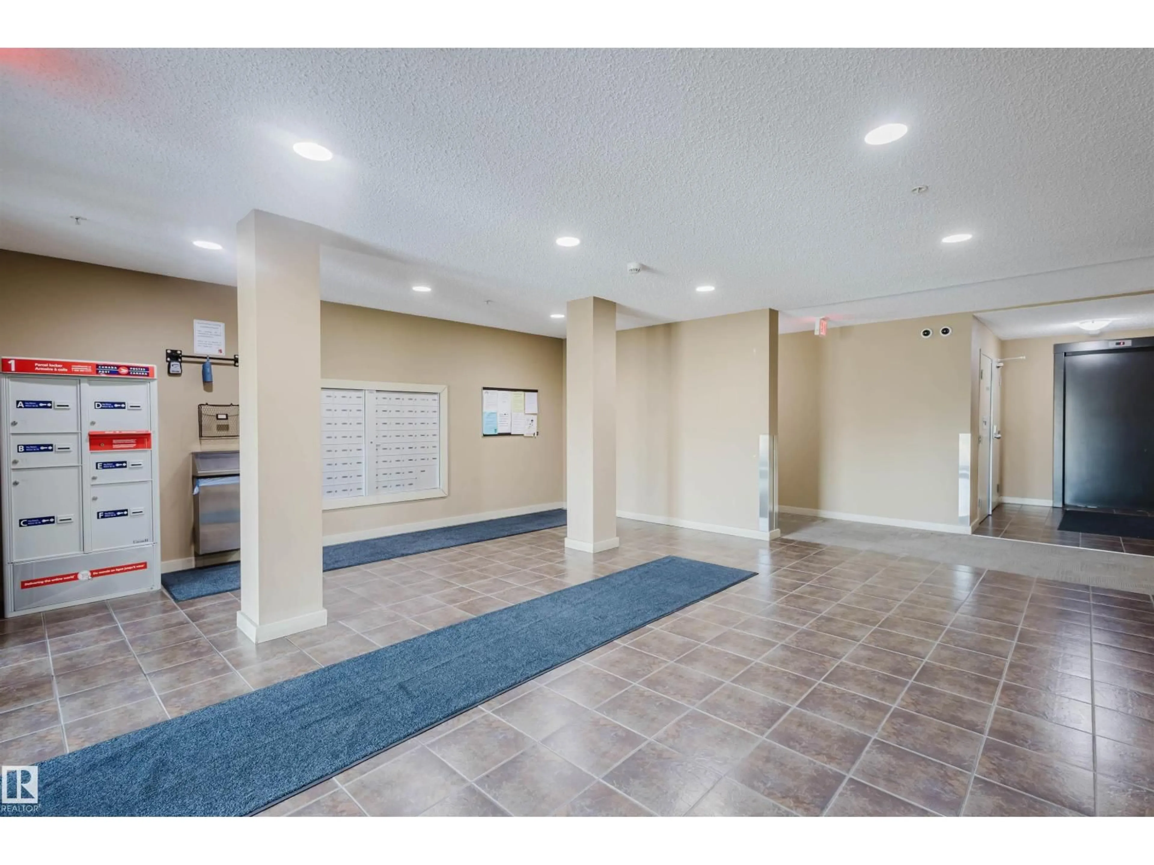 Indoor foyer for #301 - 12045 22 AV, Edmonton Alberta T6W2Y2